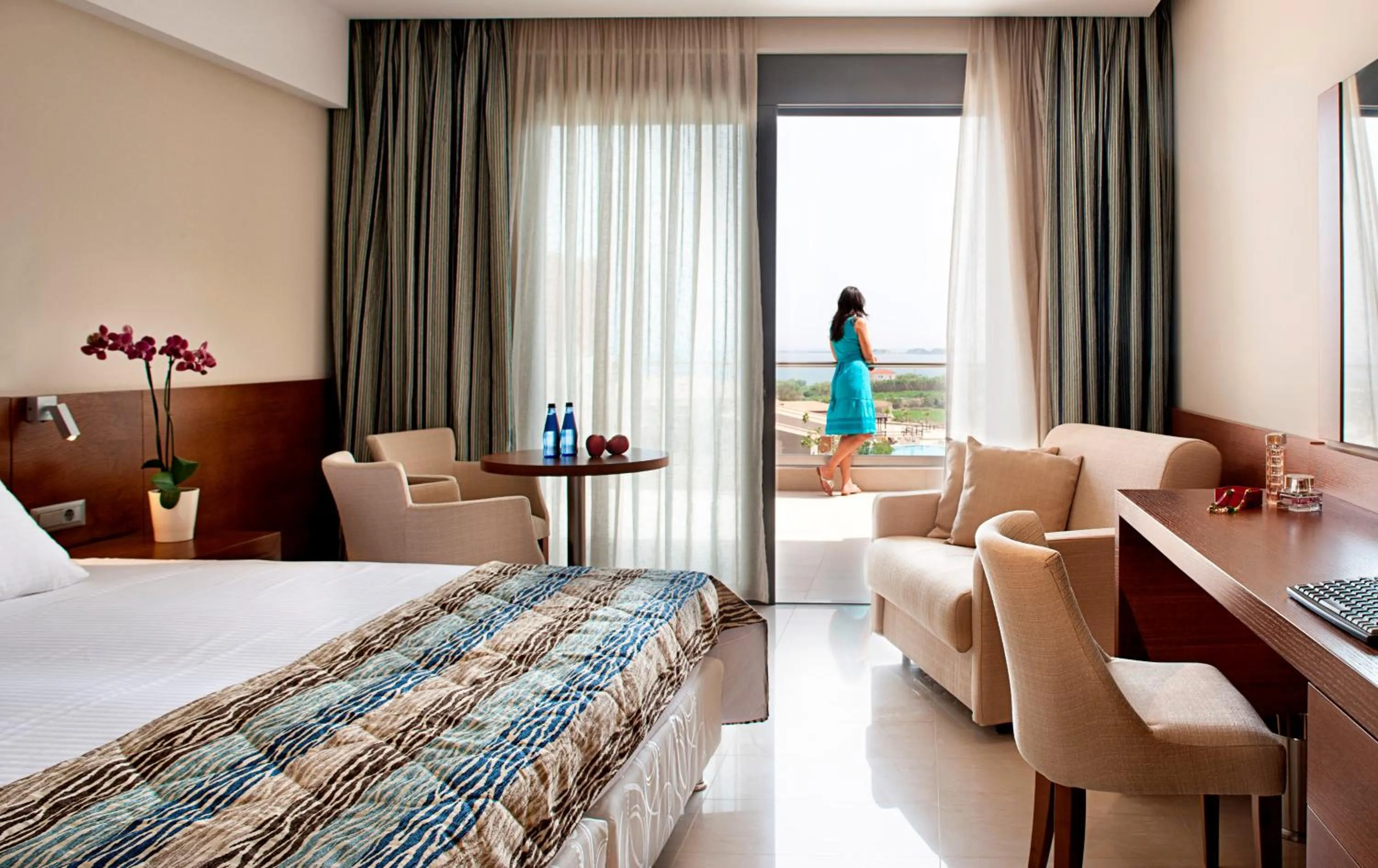 Bed in Apollonion Asterias Resort and Spa