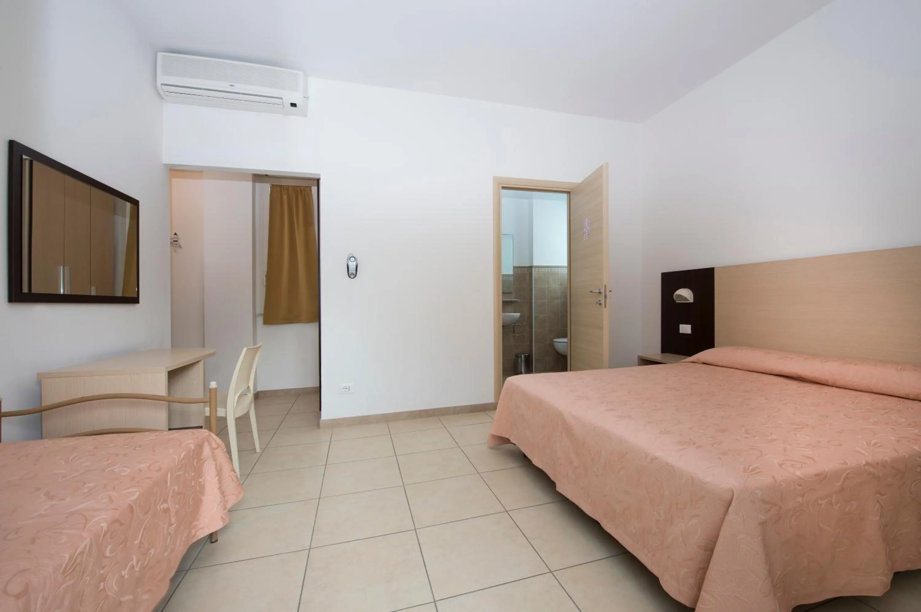 Bed in Hotel Nettuno