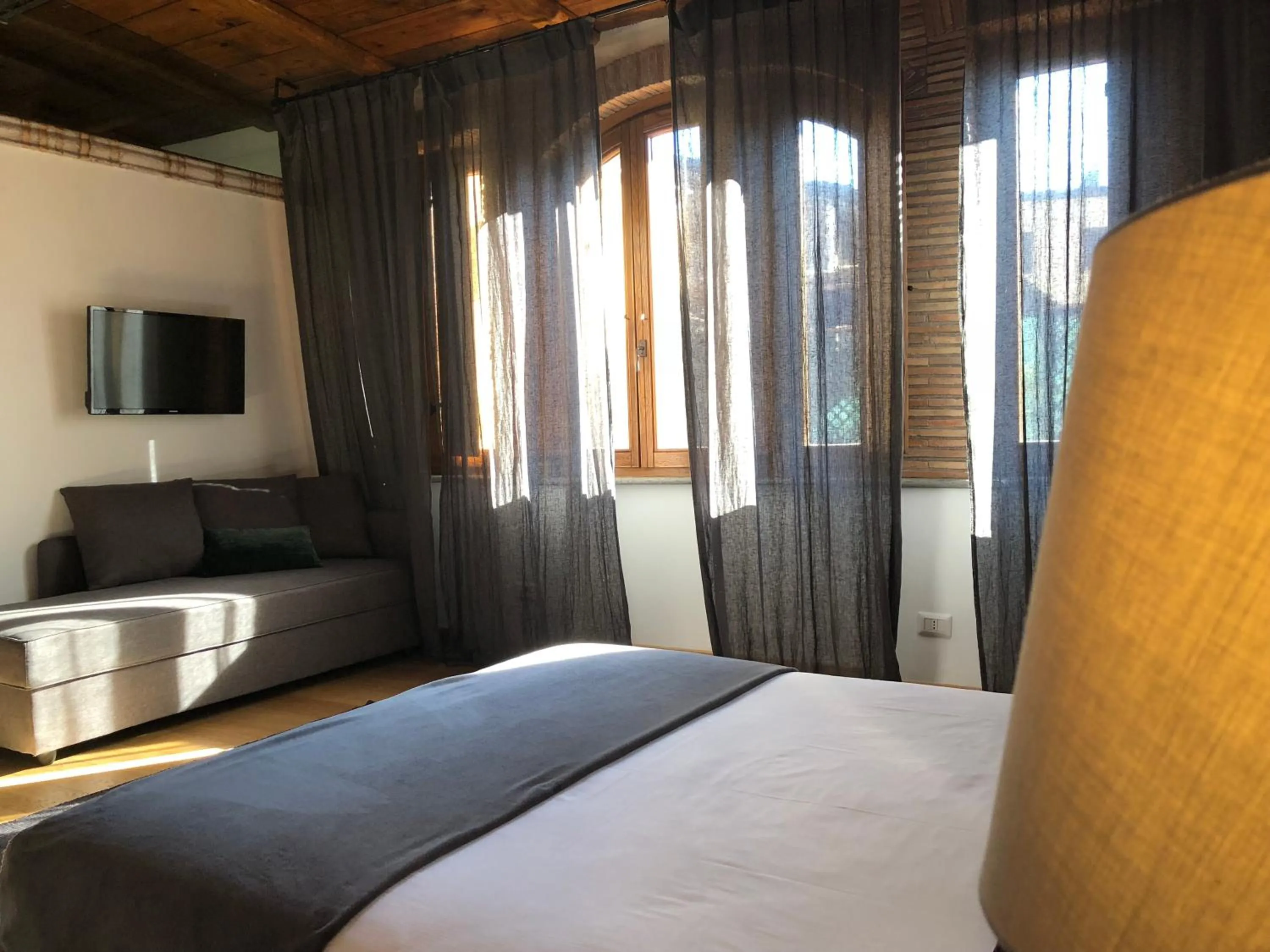 Bed in Giuturna Boutique Hotel