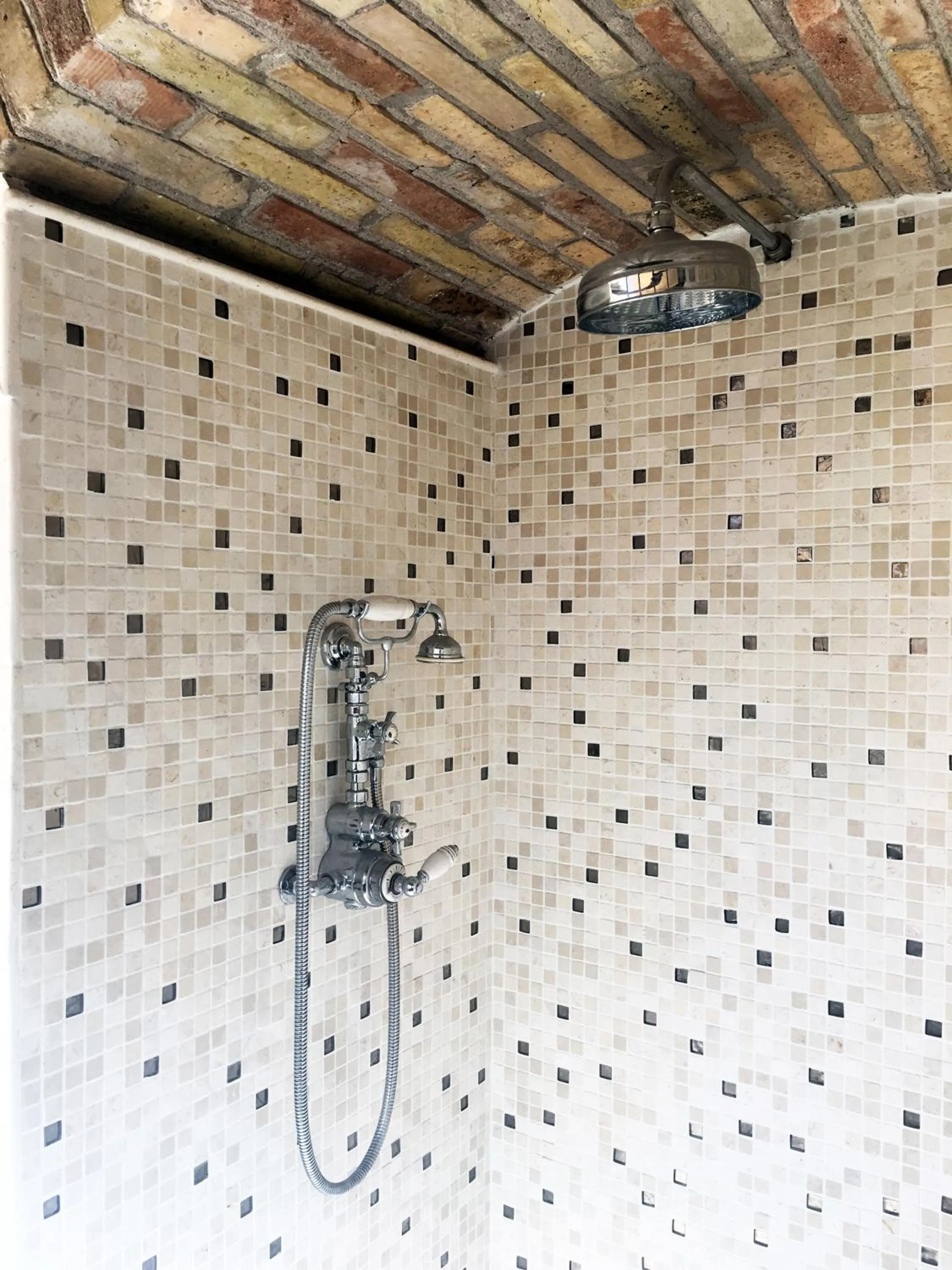 Shower in Giuturna Boutique Hotel