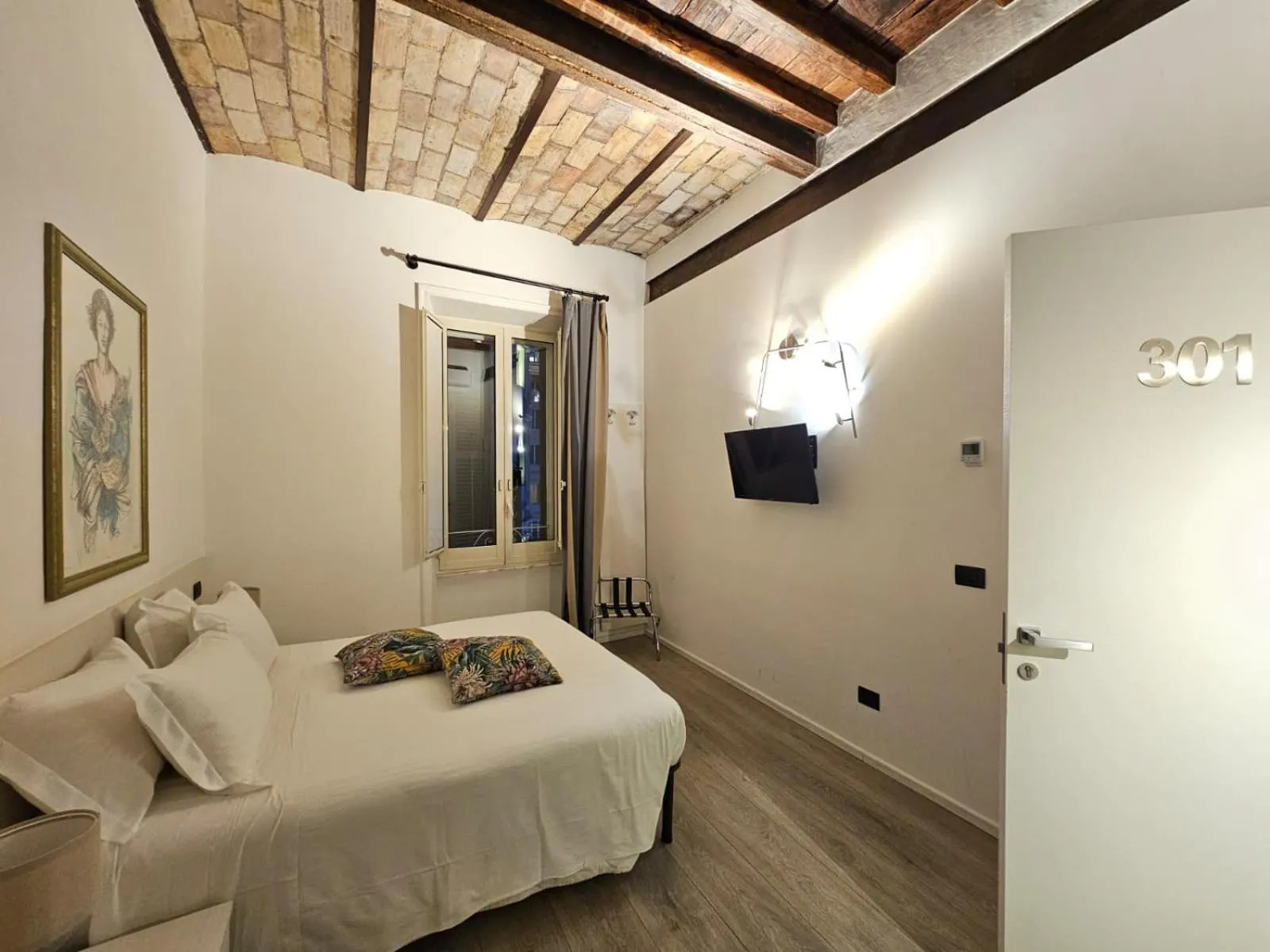 Bed in Giuturna Boutique Hotel