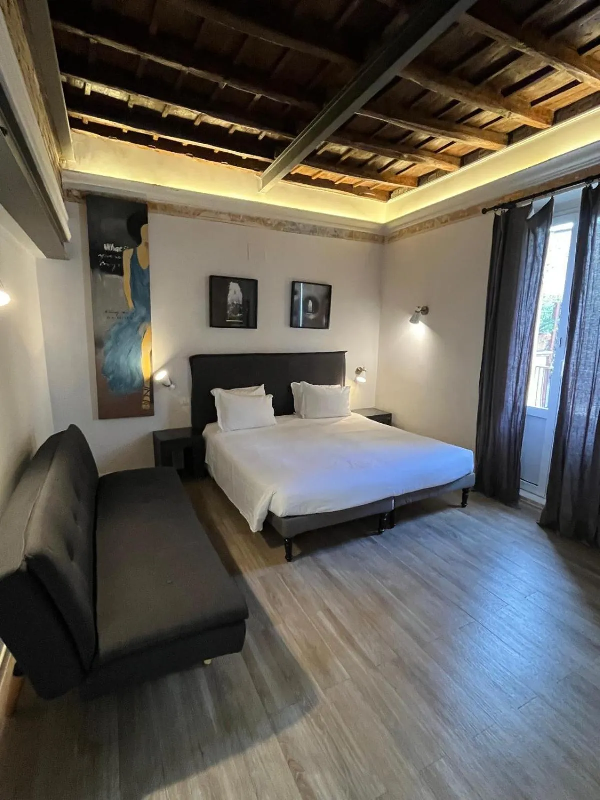 Bed in Giuturna Boutique Hotel