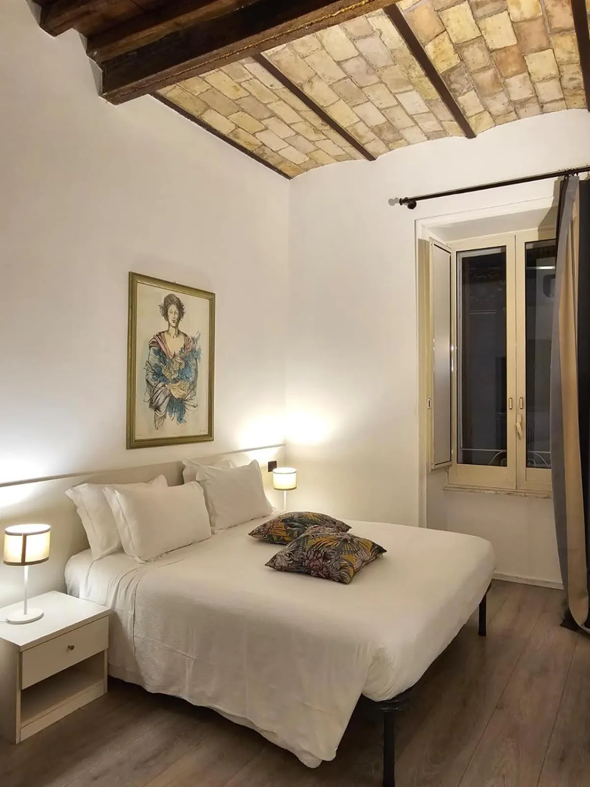 Bed in Giuturna Boutique Hotel