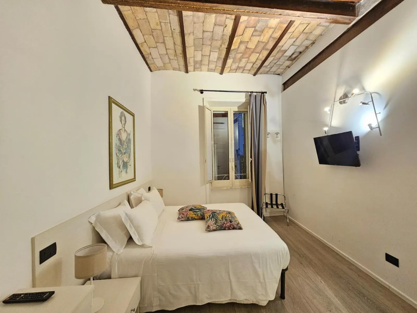 Bed in Giuturna Boutique Hotel