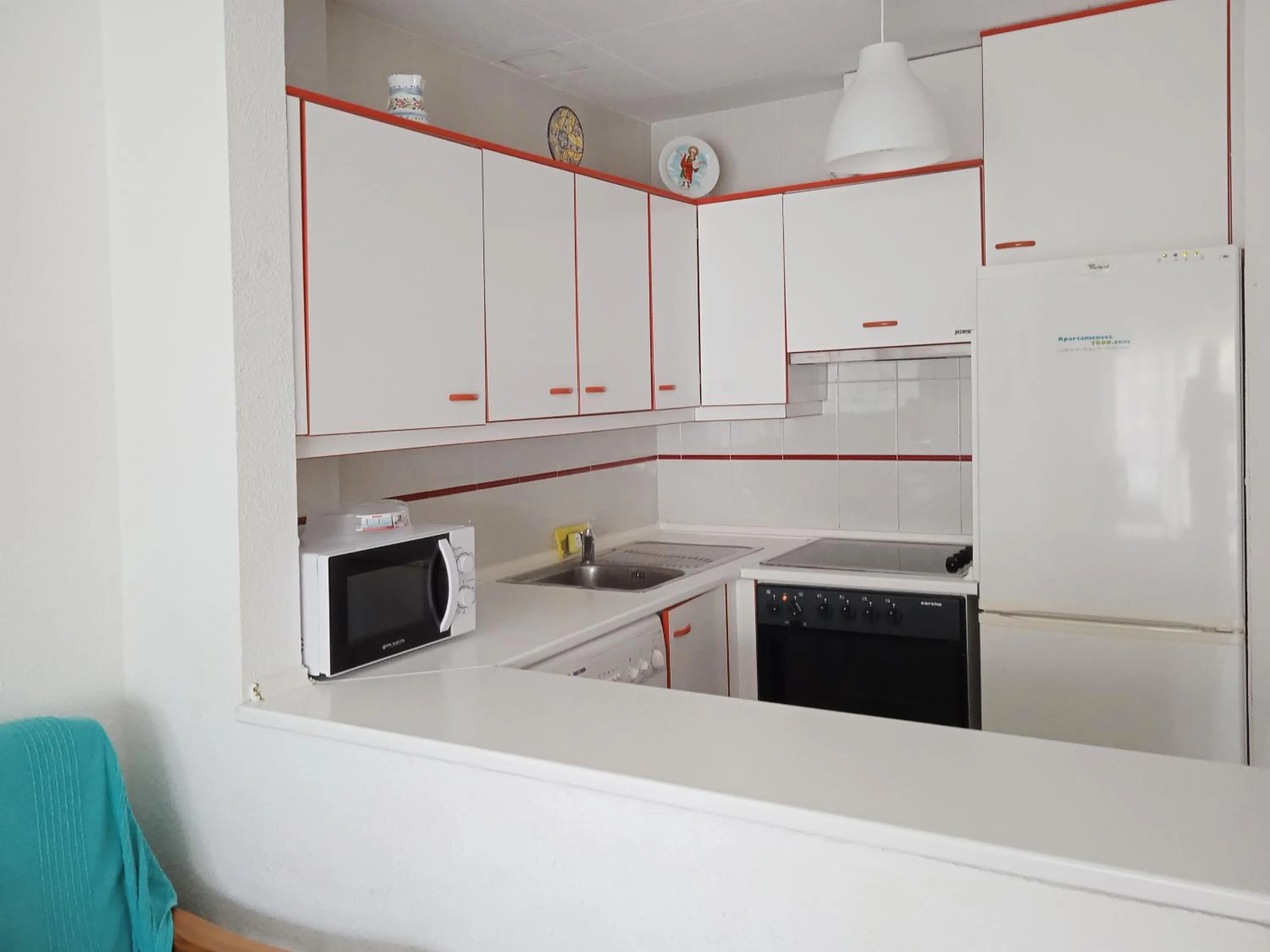 Kitchen or kitchenette in Apartamentos Surfing 3000