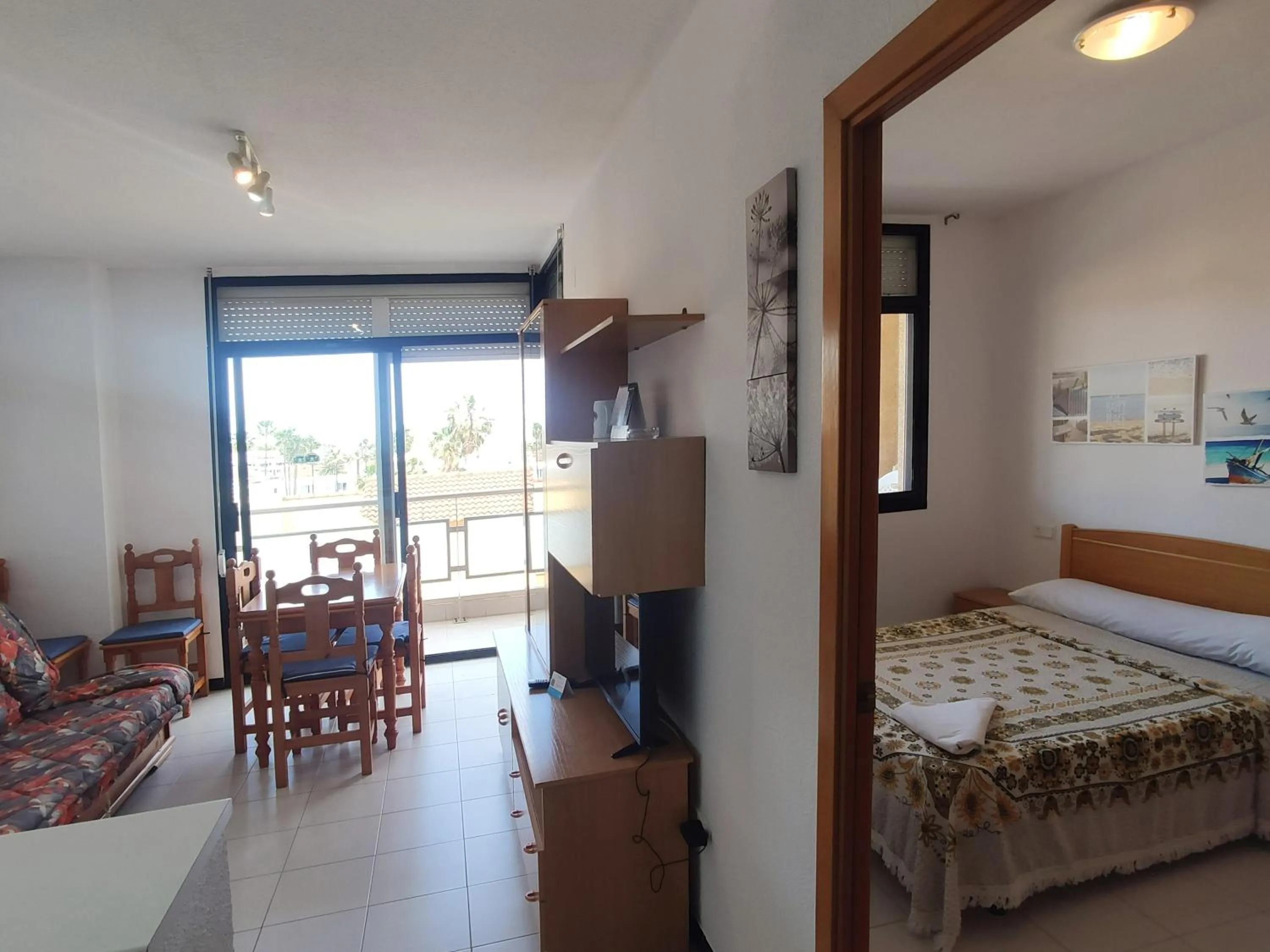 Living room, Bed in Apartamentos Surfing 3000