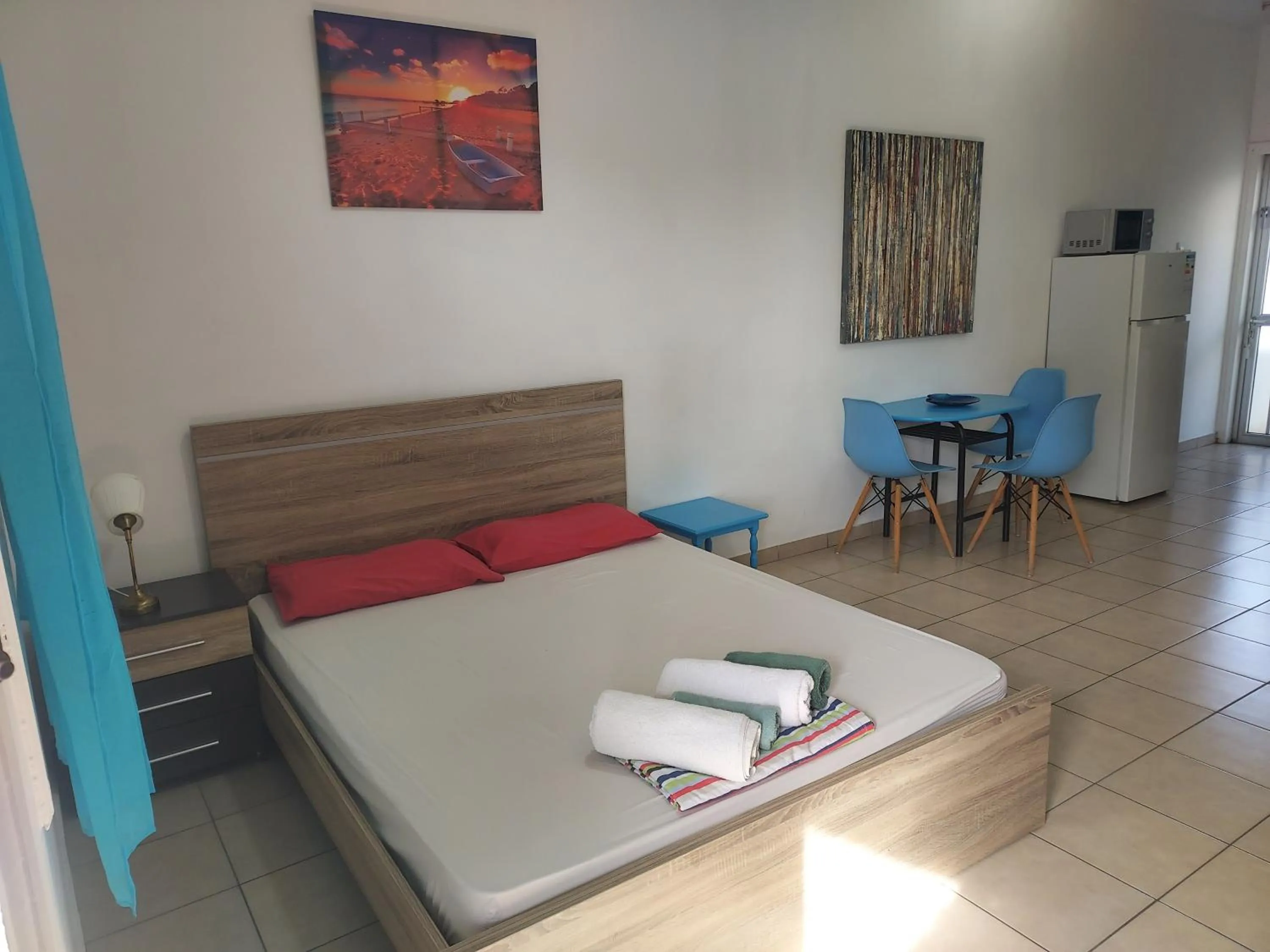 Seating area, Bed in Sea Apartments