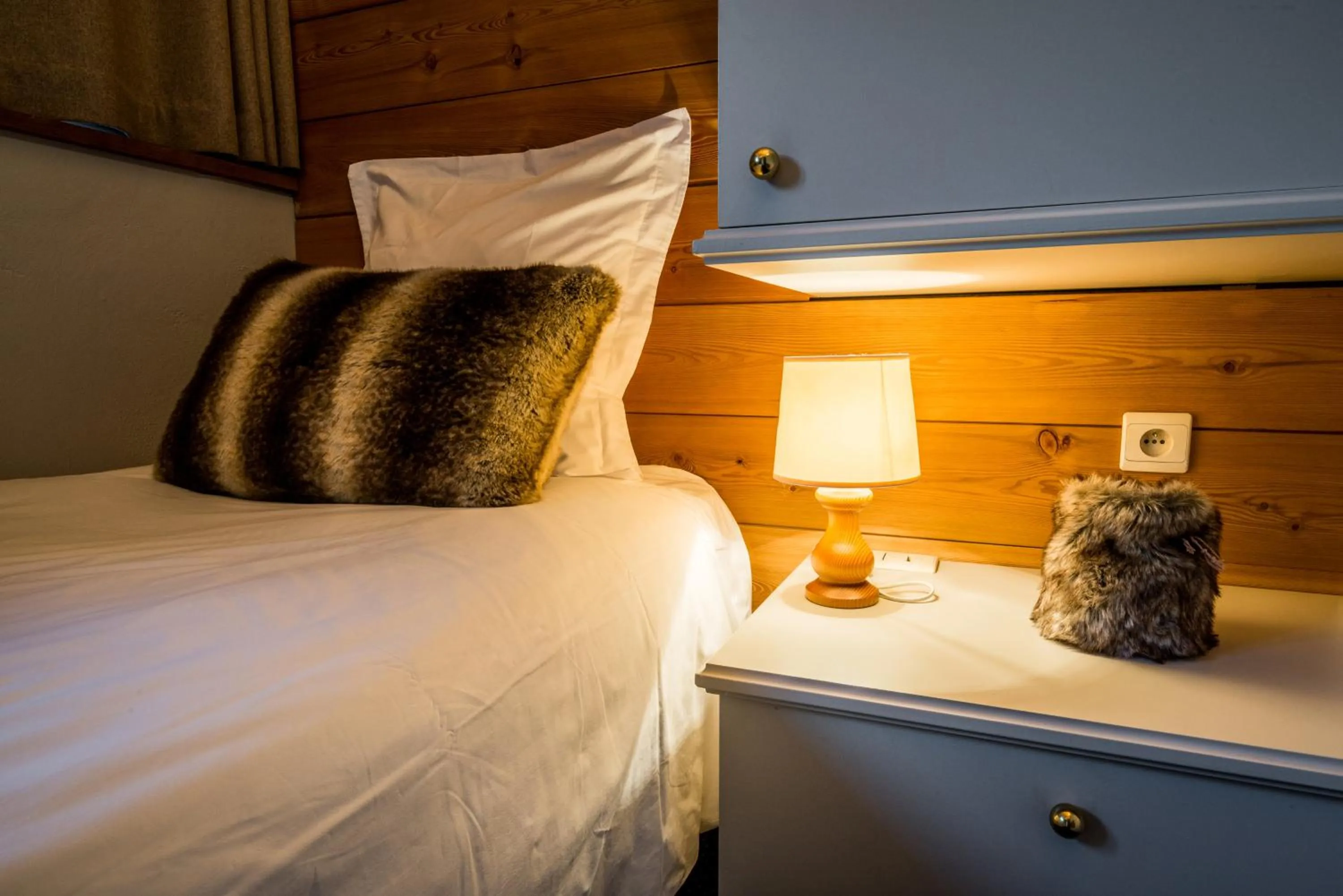 Bed in Hotel Le Samoyede