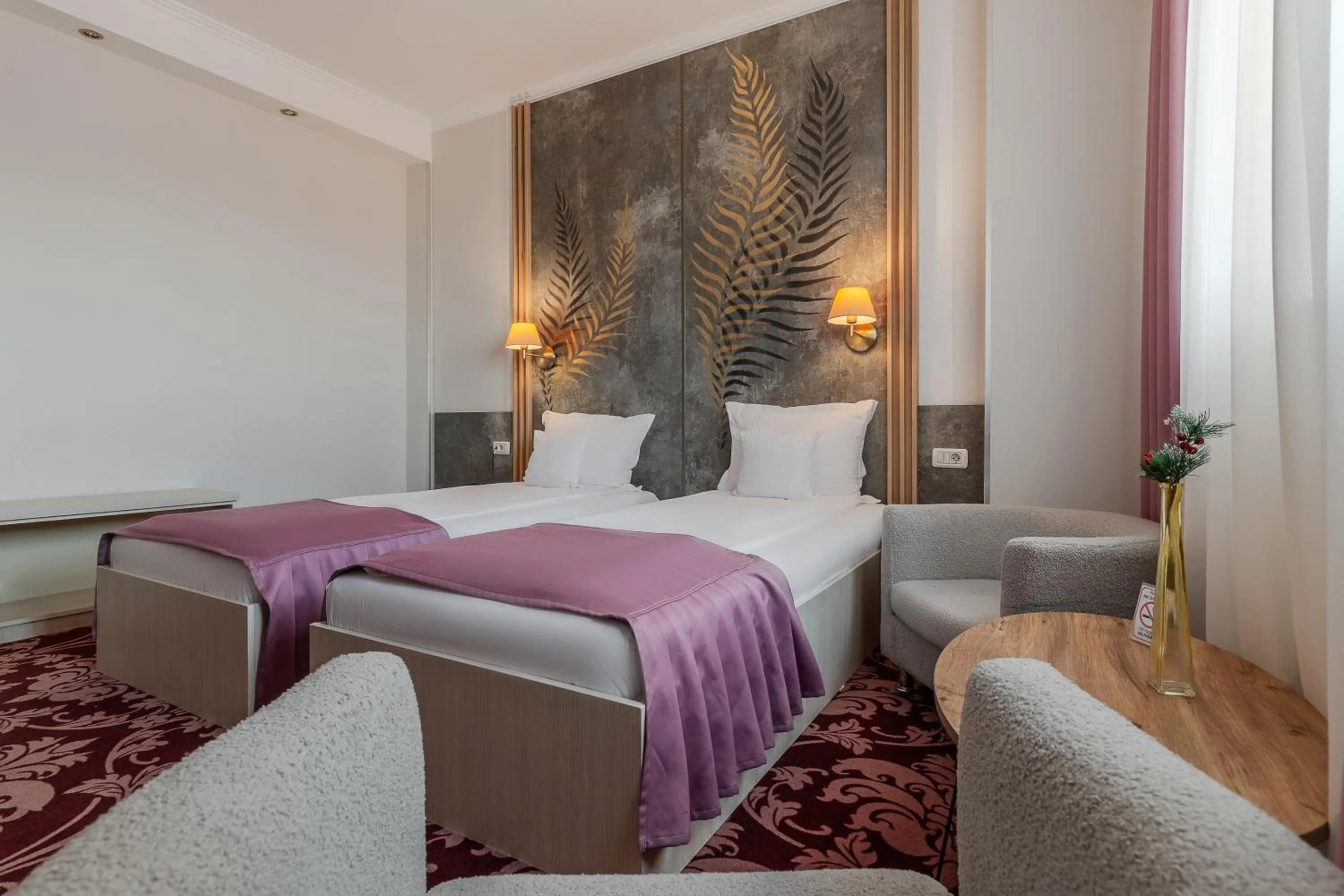 Bed in Hotel Nevis Wellness & SPA