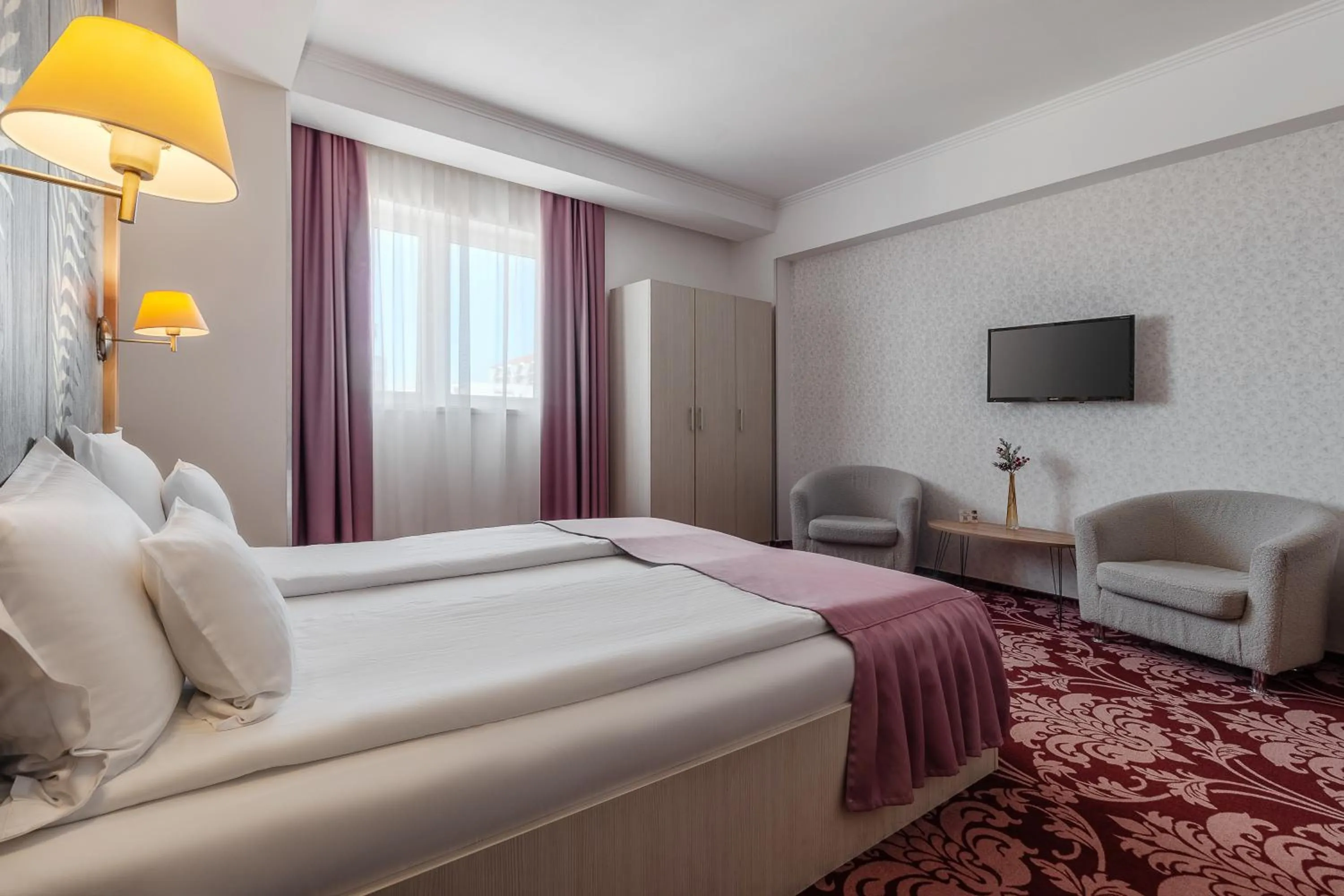 Bed in Hotel Nevis Wellness & SPA