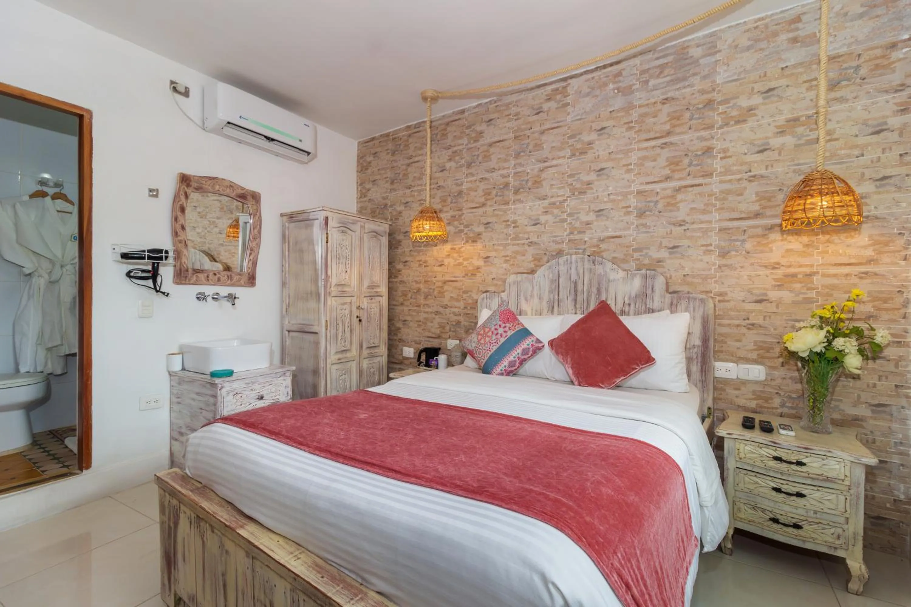 Bed in Voilá Signature Casa Isabel