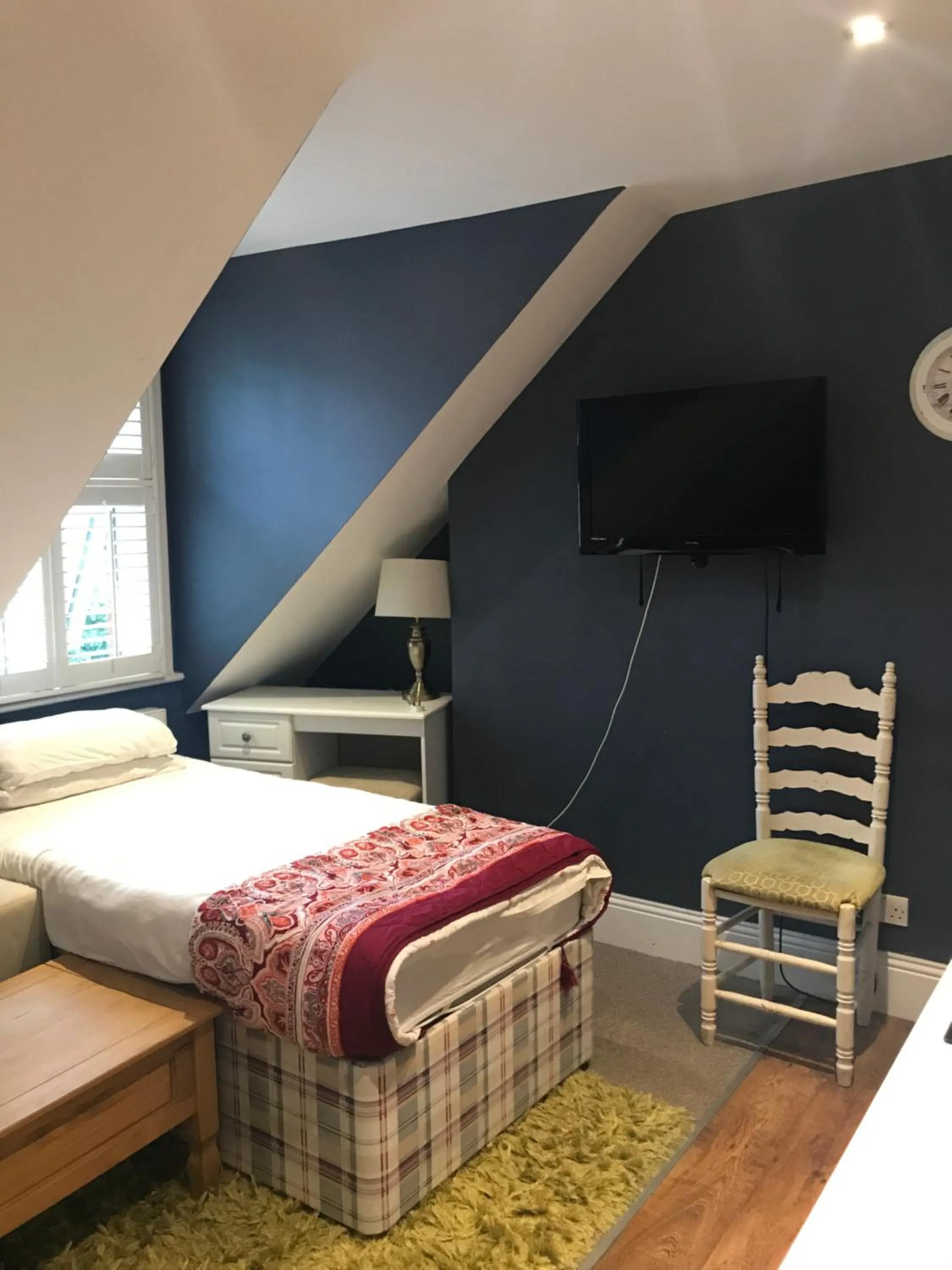 Bed in Acacia Villas Guest House