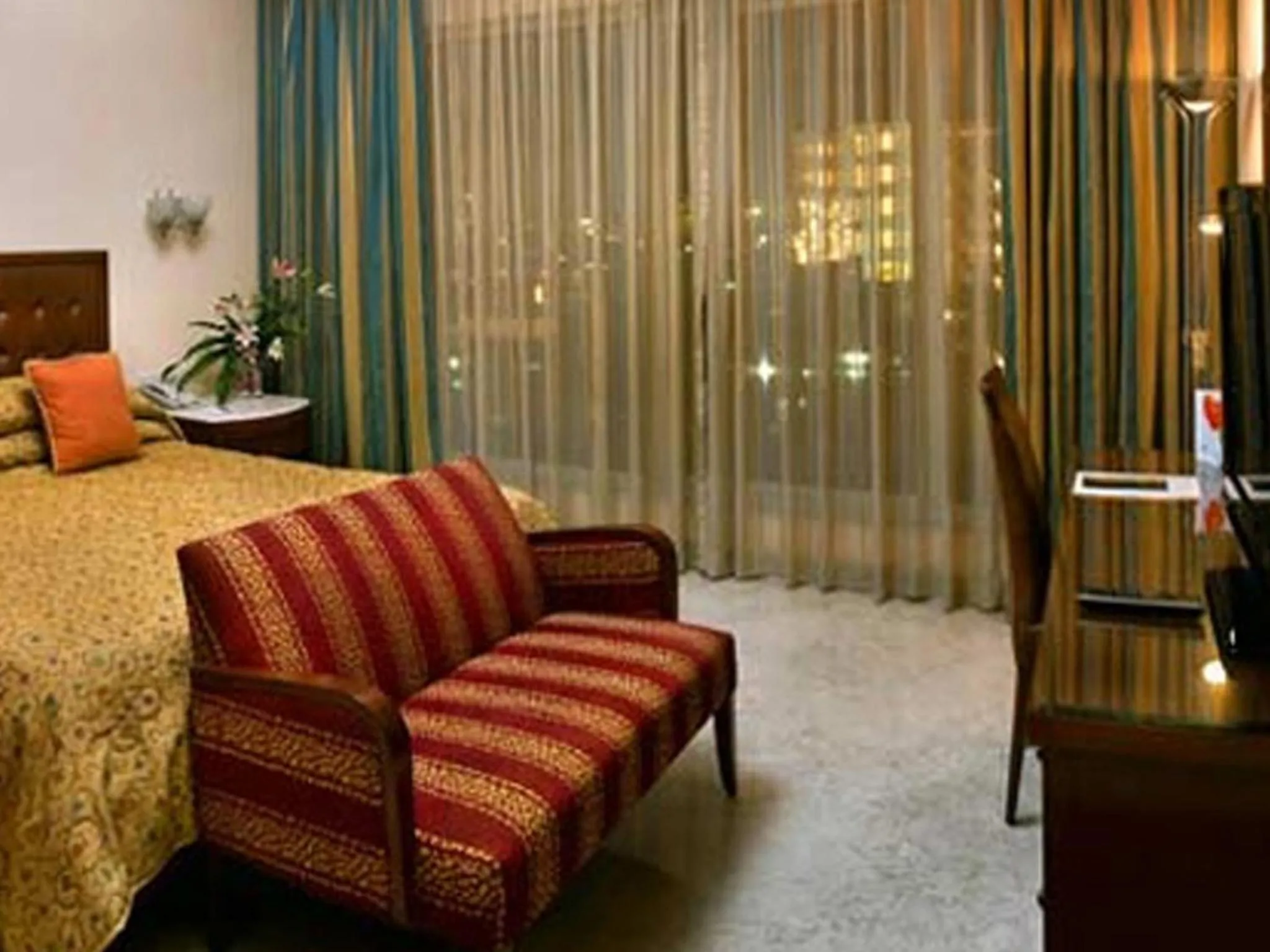 Photo of the whole room, Bed in The Lalit Mumbai