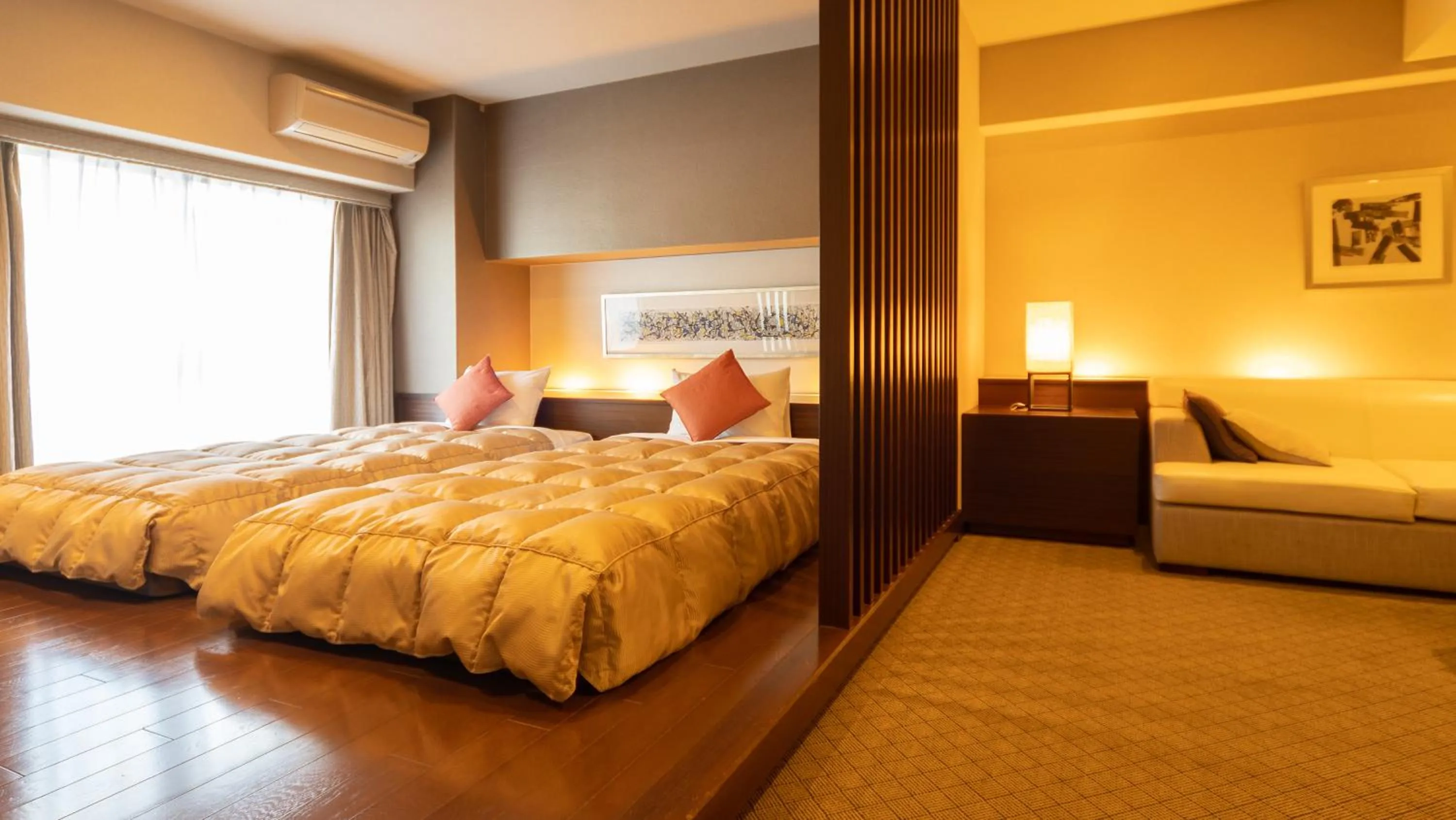 Bed in Hyper Resort Villa Shionoe