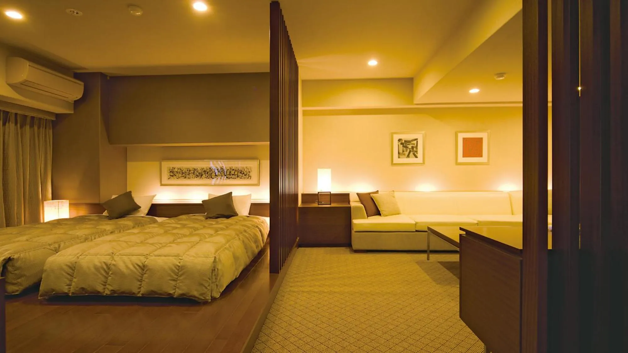 Bed in Hyper Resort Villa Shionoe