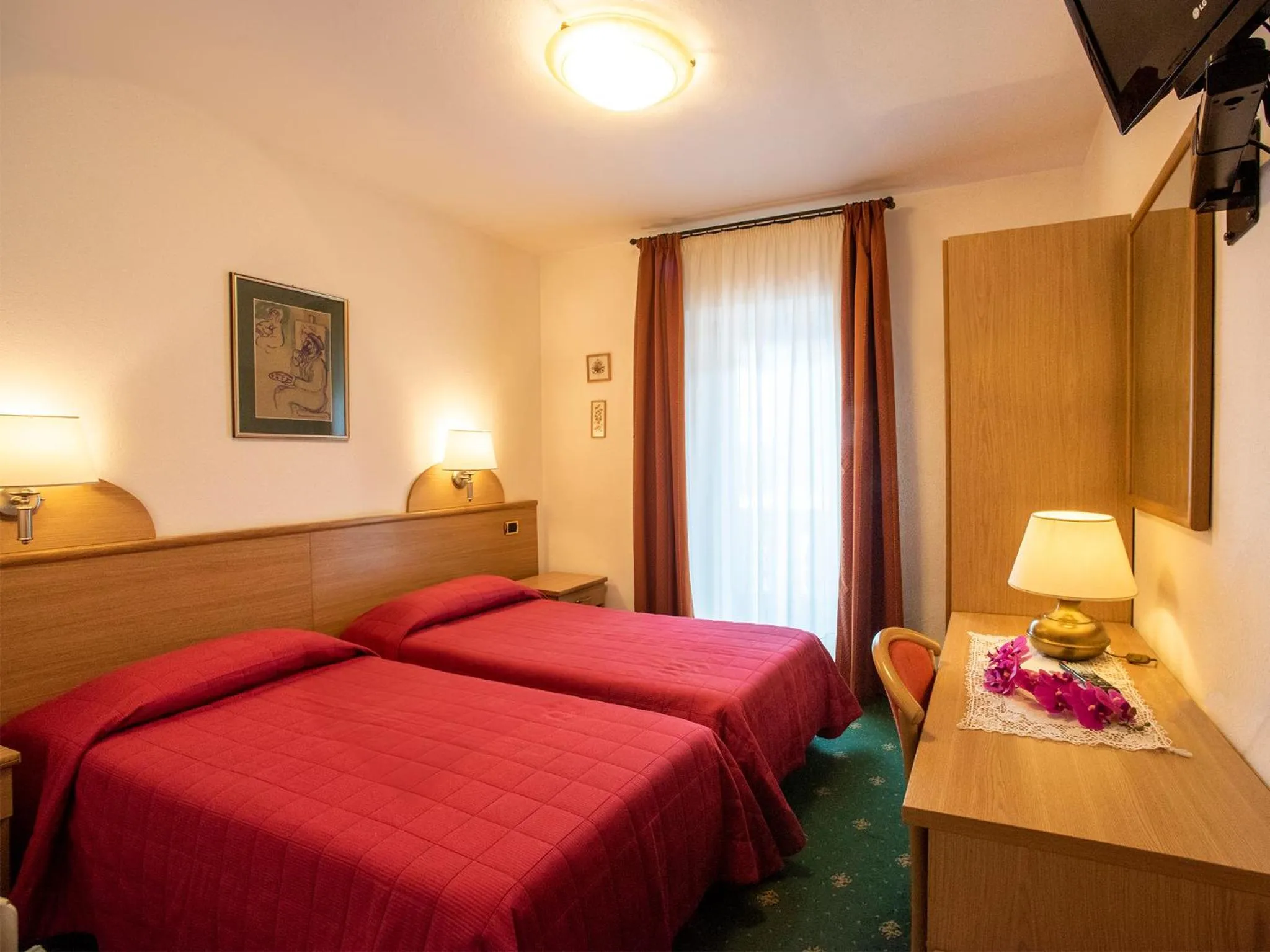 Bed in Hotel Adriana