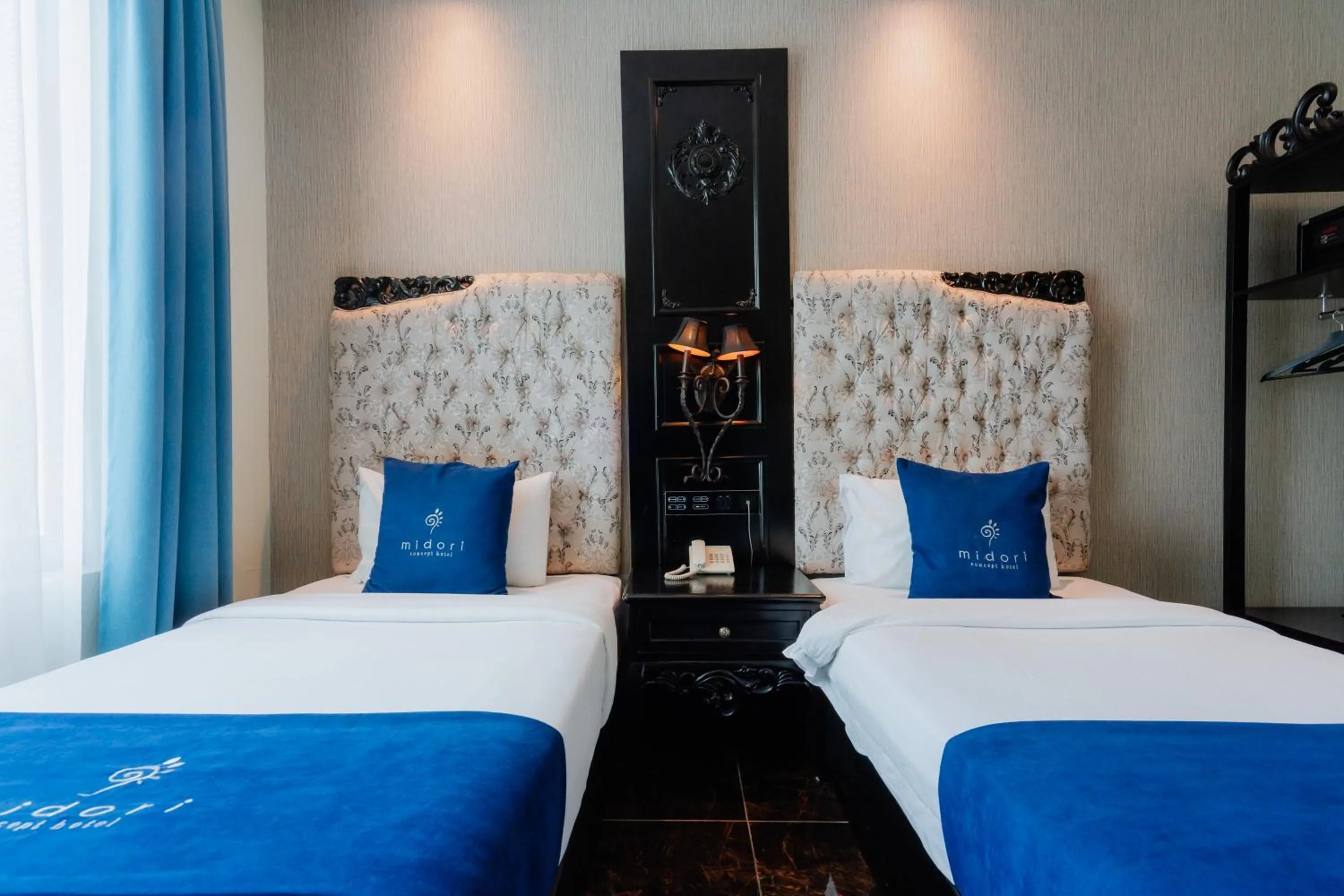 Bed in Midori Concept Hotel