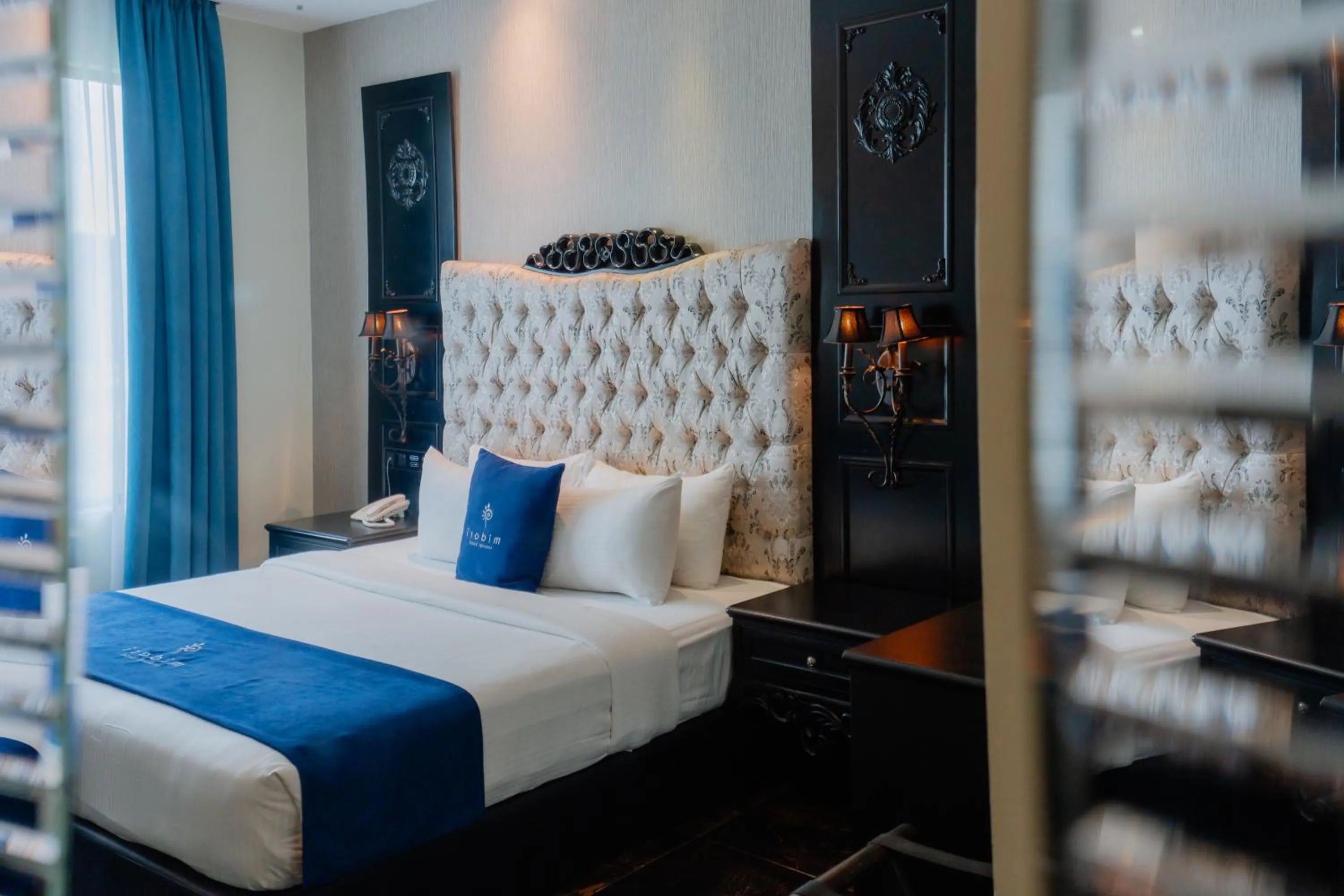 Bed in Midori Concept Hotel