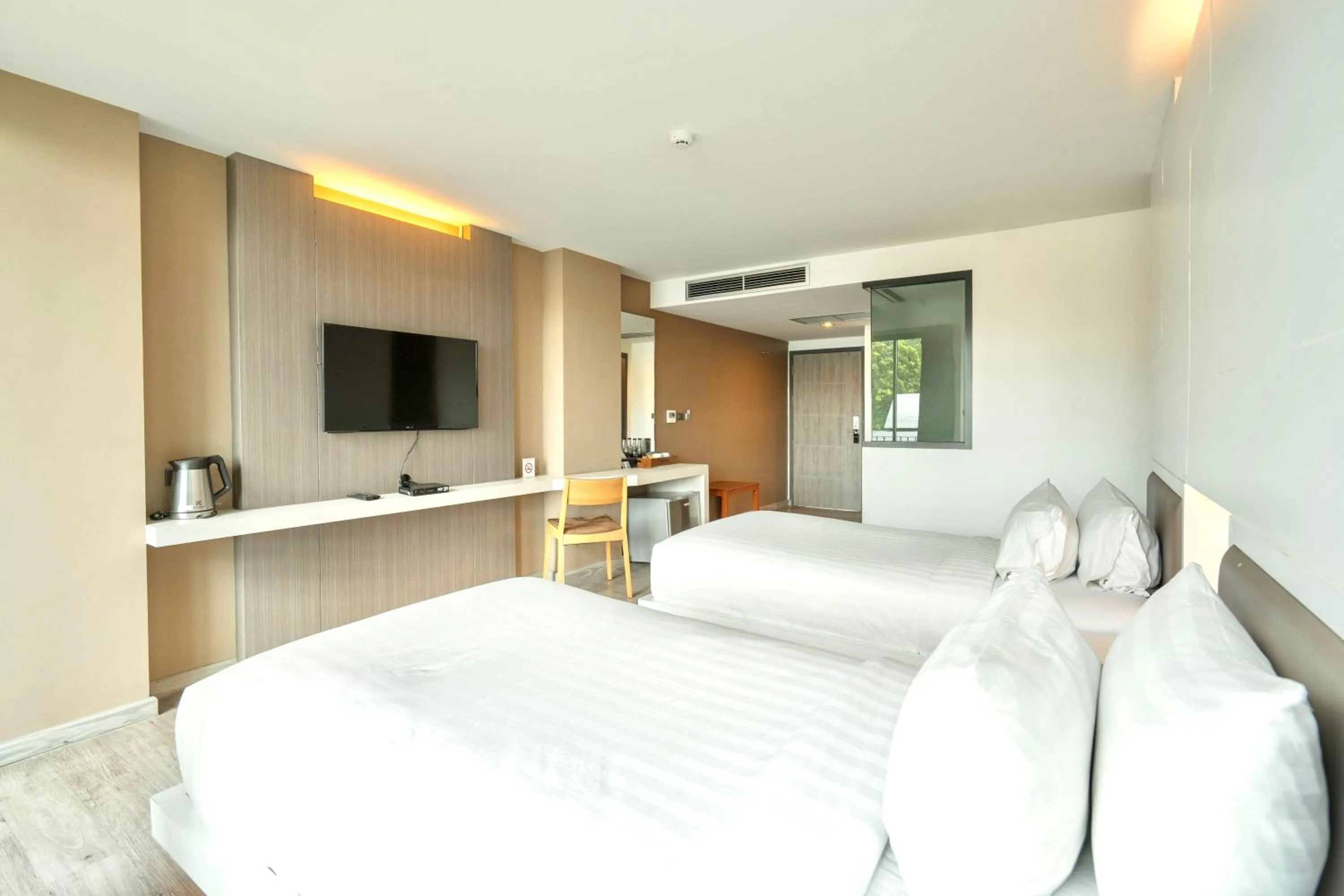 Photo of the whole room, Bed in The Zense Boutique Hotel