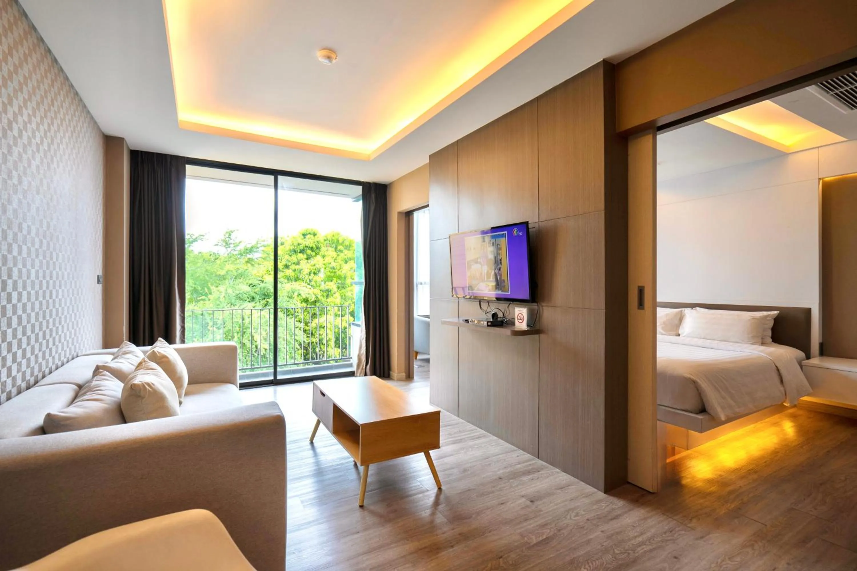 Living room, Bed in The Zense Boutique Hotel