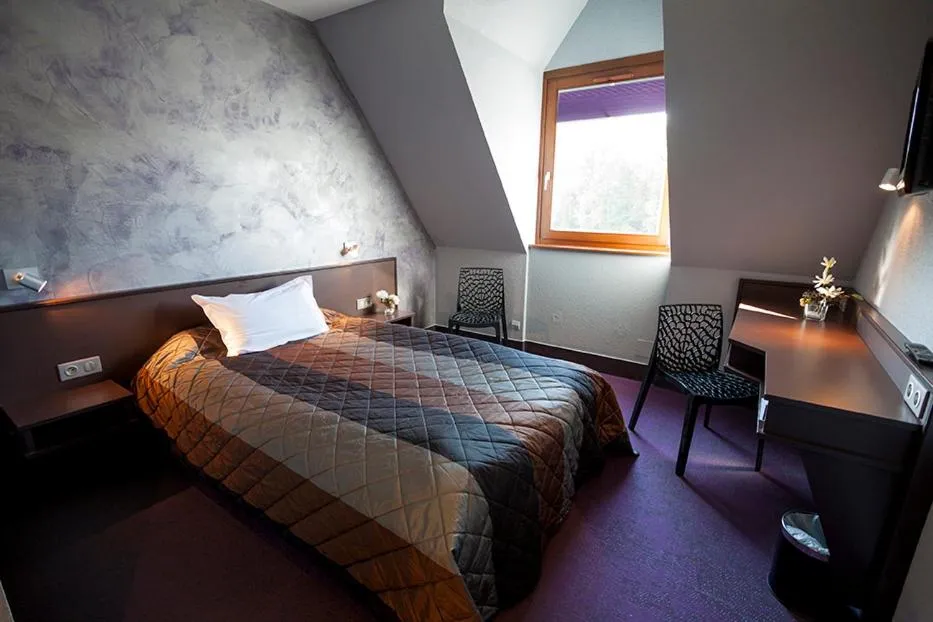 Bed in Hôtel Restaurant Les Alizés