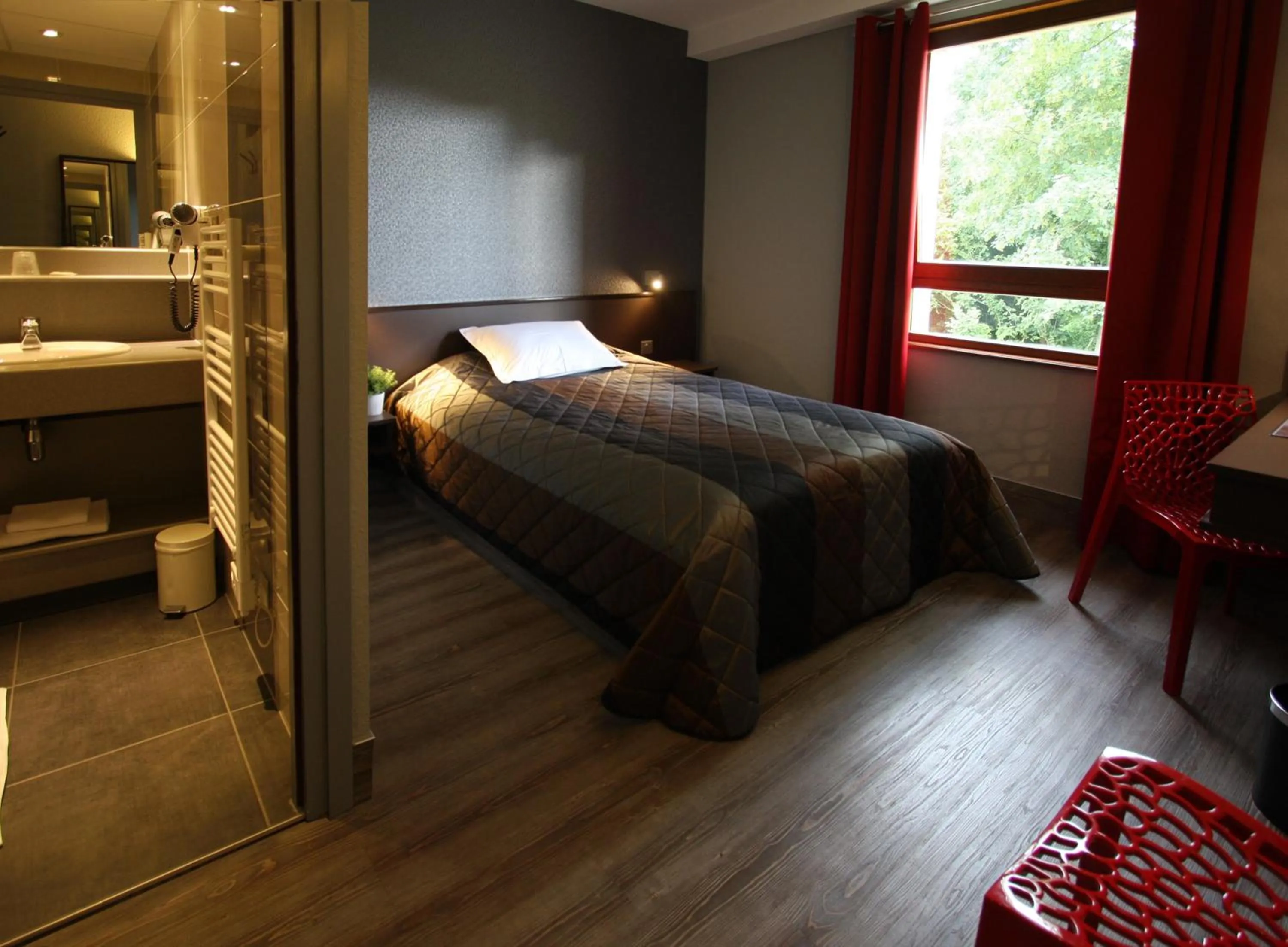 Bed in Hôtel Restaurant Les Alizés