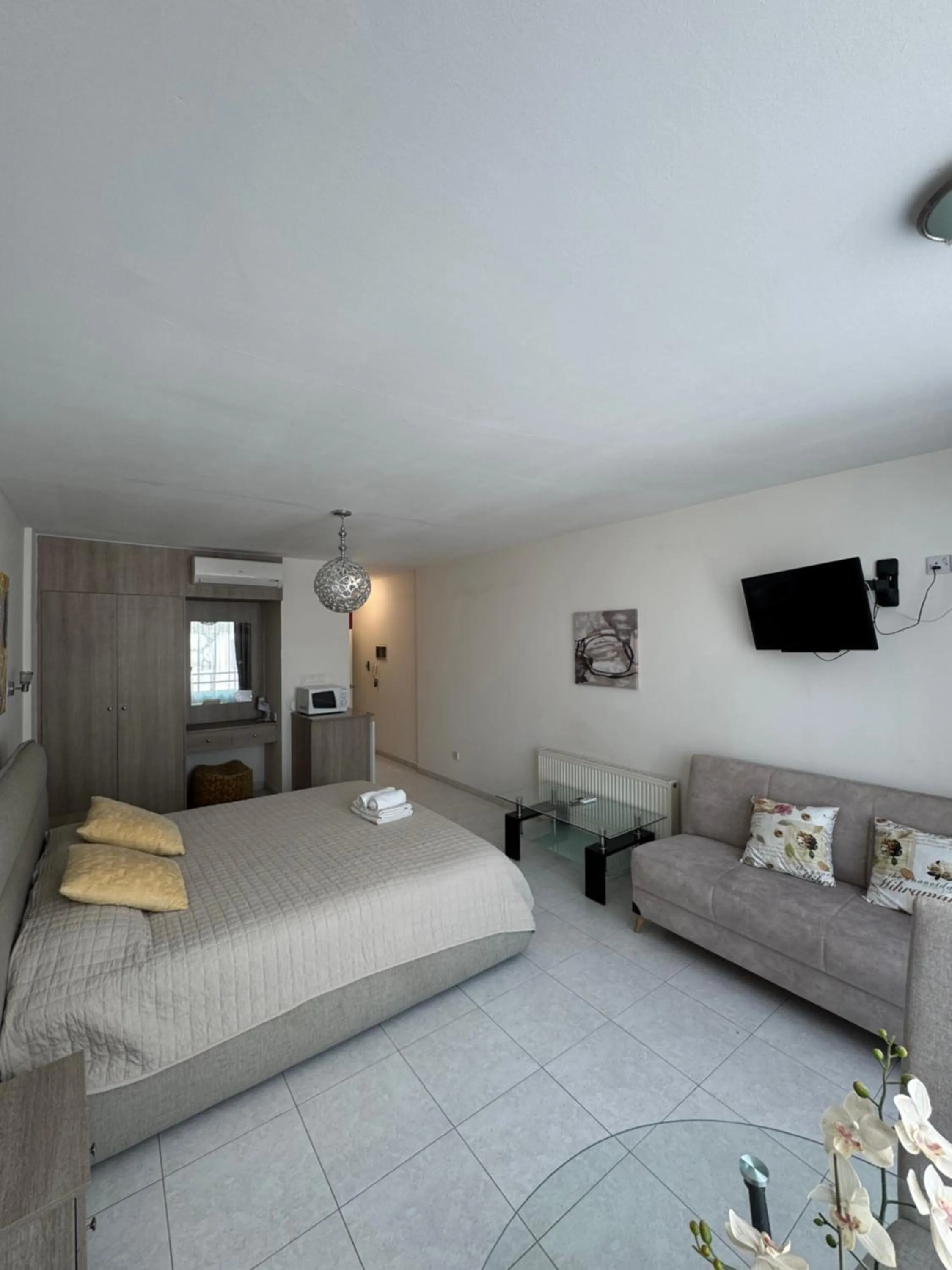 Living room, Bed in Marianna Hotel Apartments