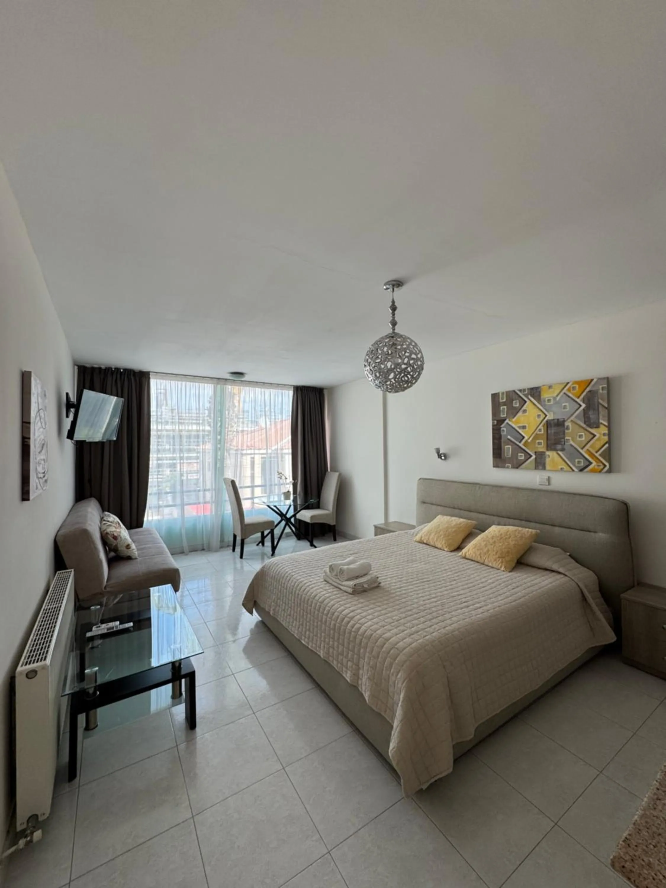 Bed in Marianna Hotel Apartments