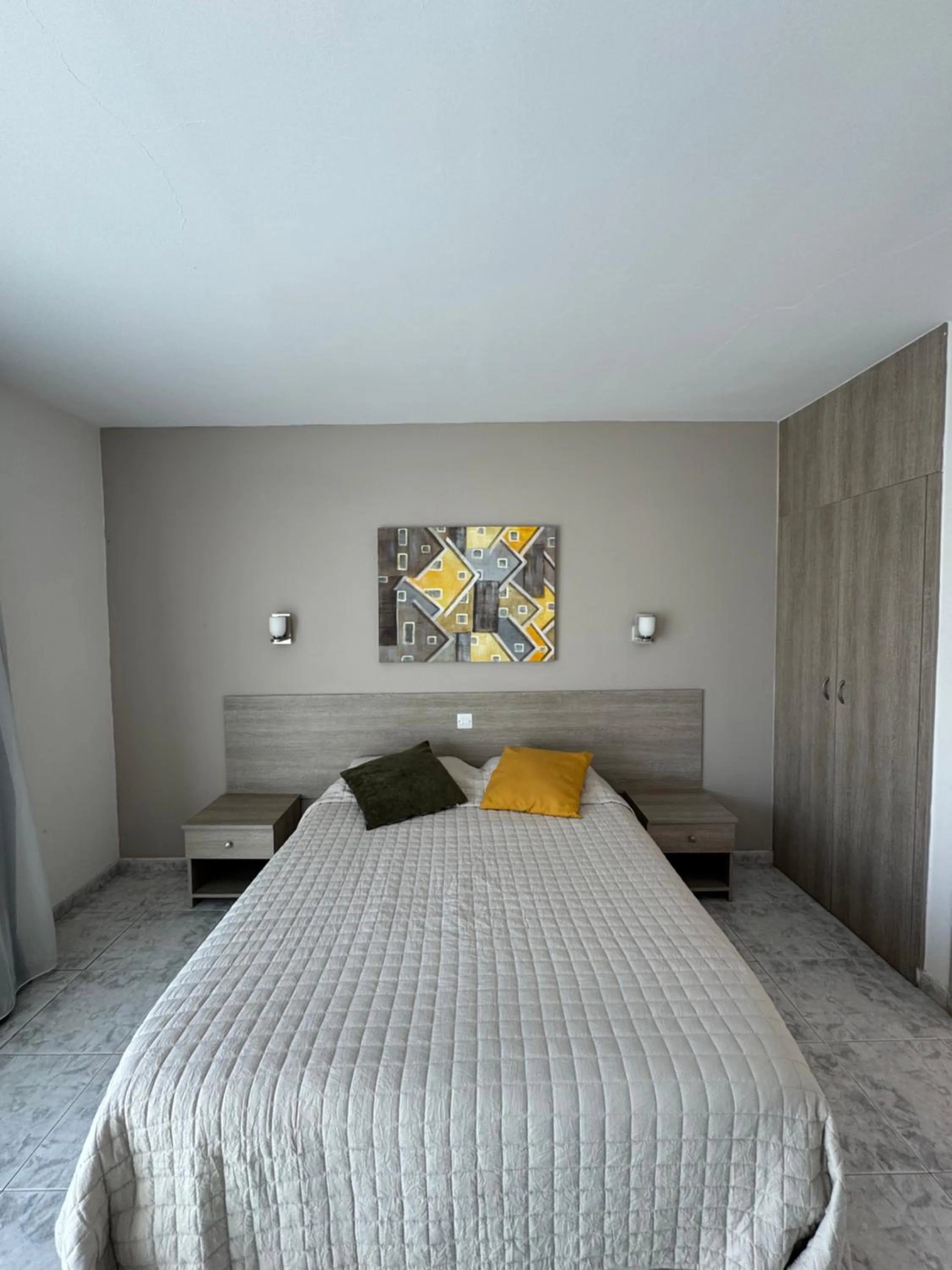 Bed in Marianna Hotel Apartments