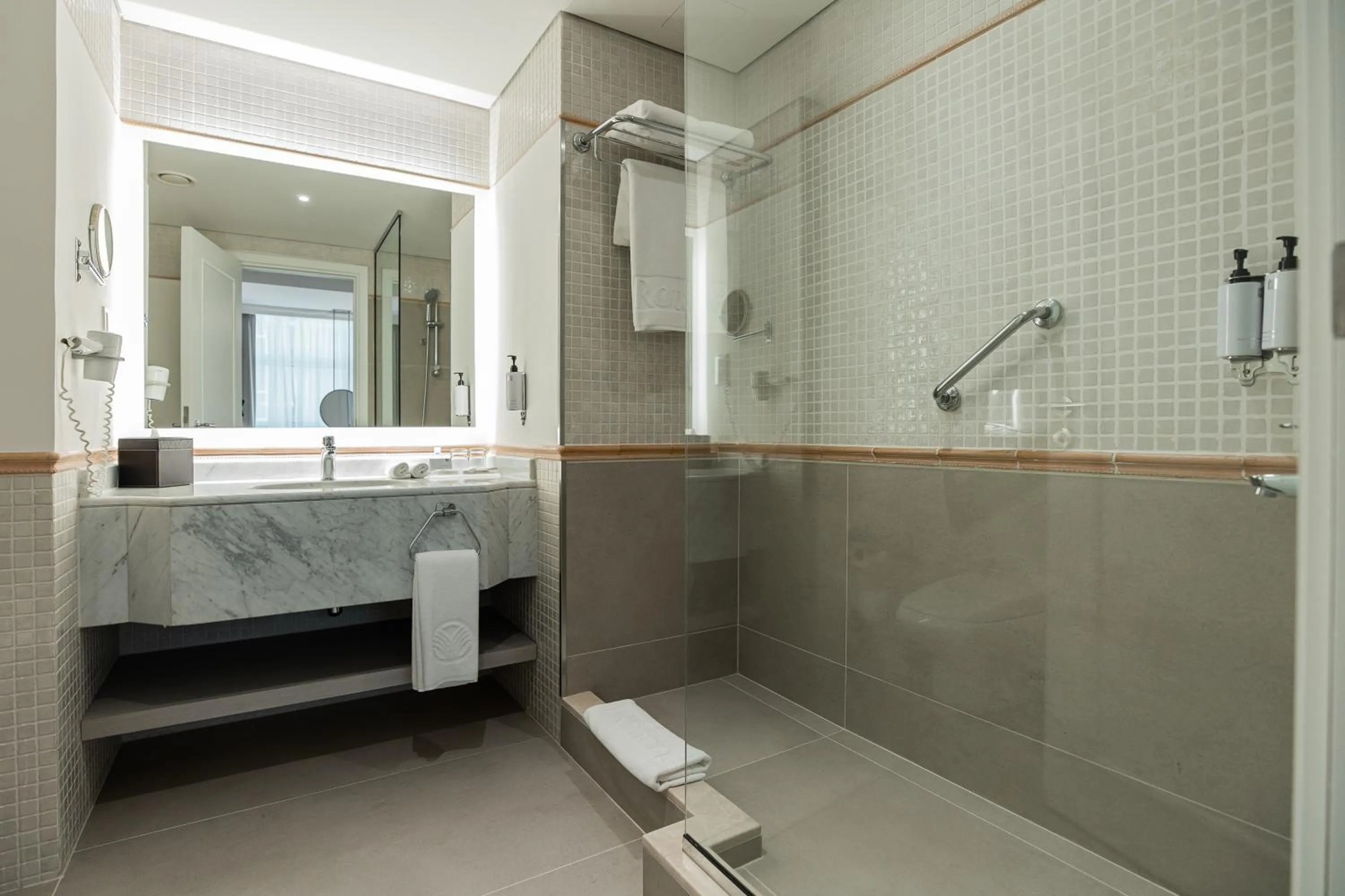 Bathroom in Beach Rotana – All Suites