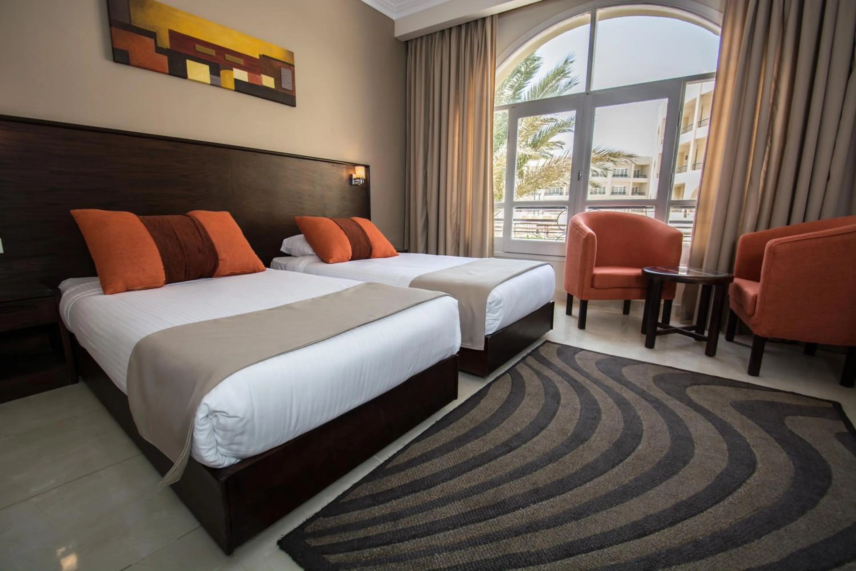 Bed in Sunny Days Mirette Family Resort