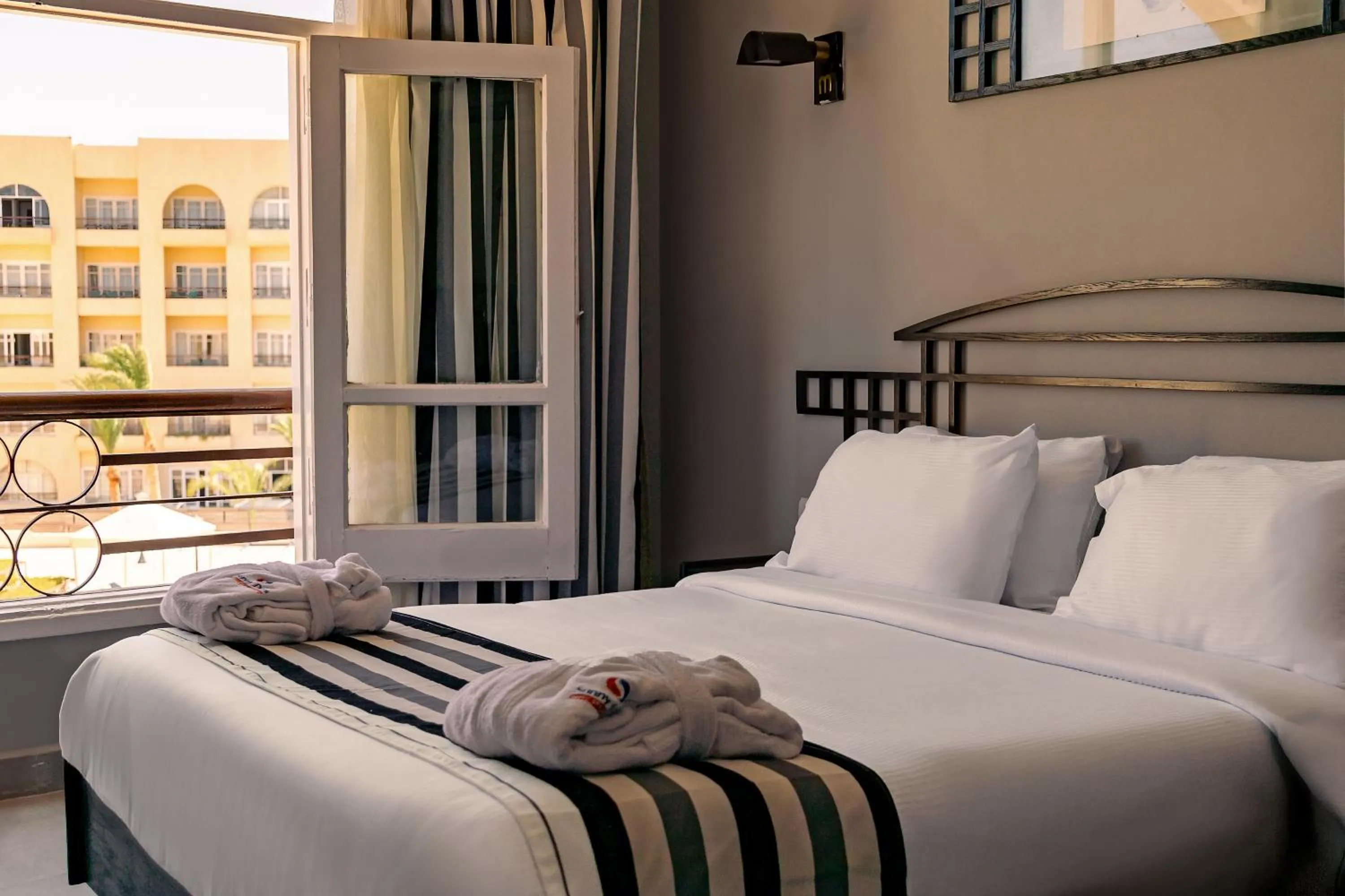 Bed in Sunny Days Mirette Family Resort