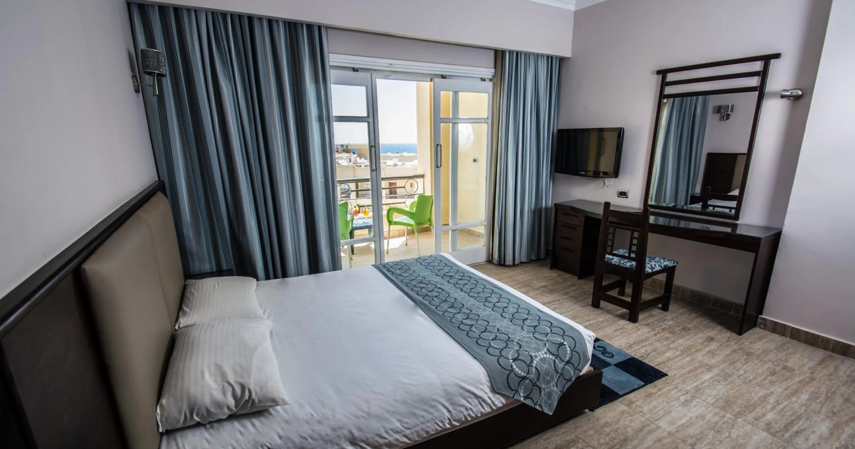 Bed in Sunny Days Mirette Family Resort