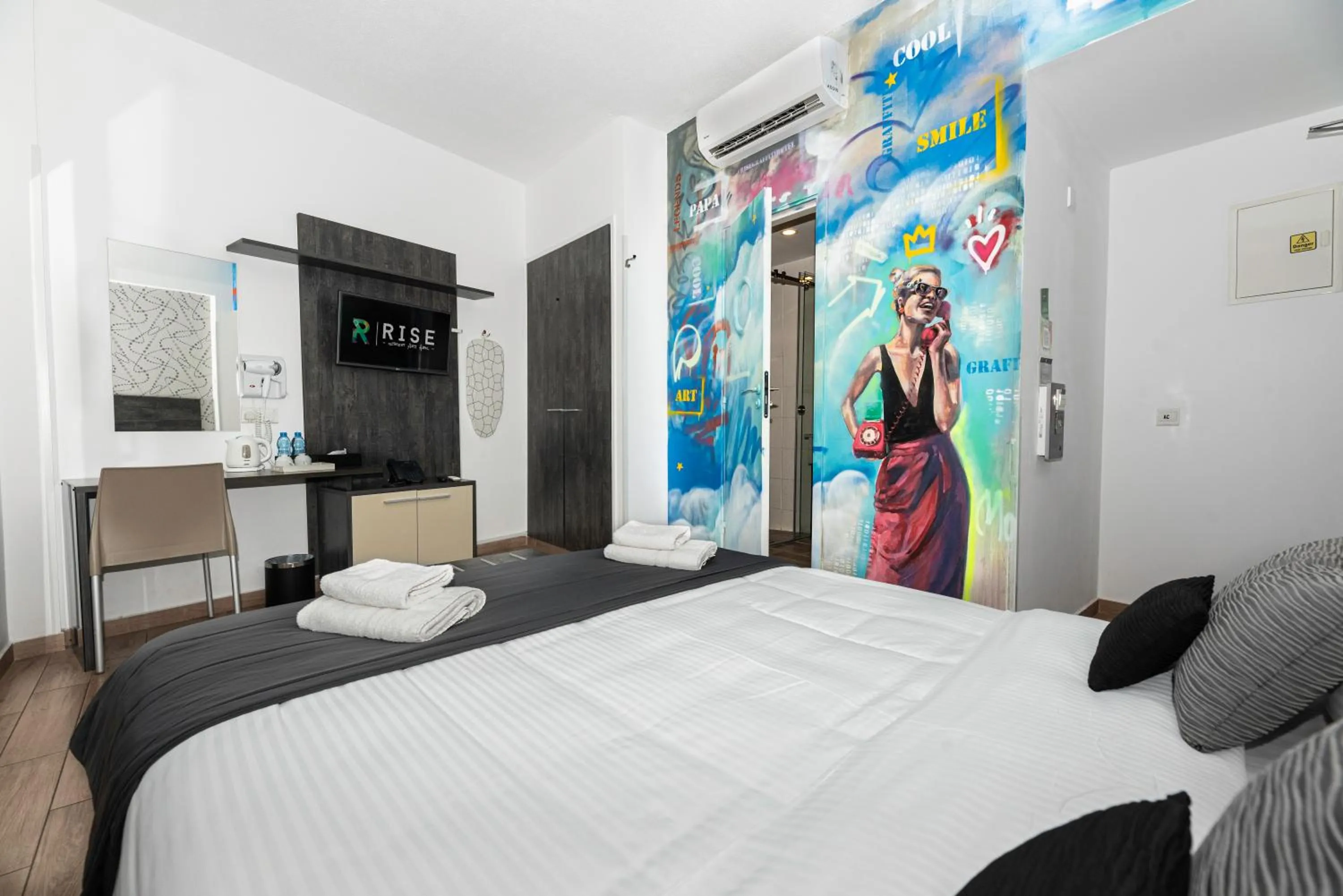 Bed in Rise Urban Art Hotel