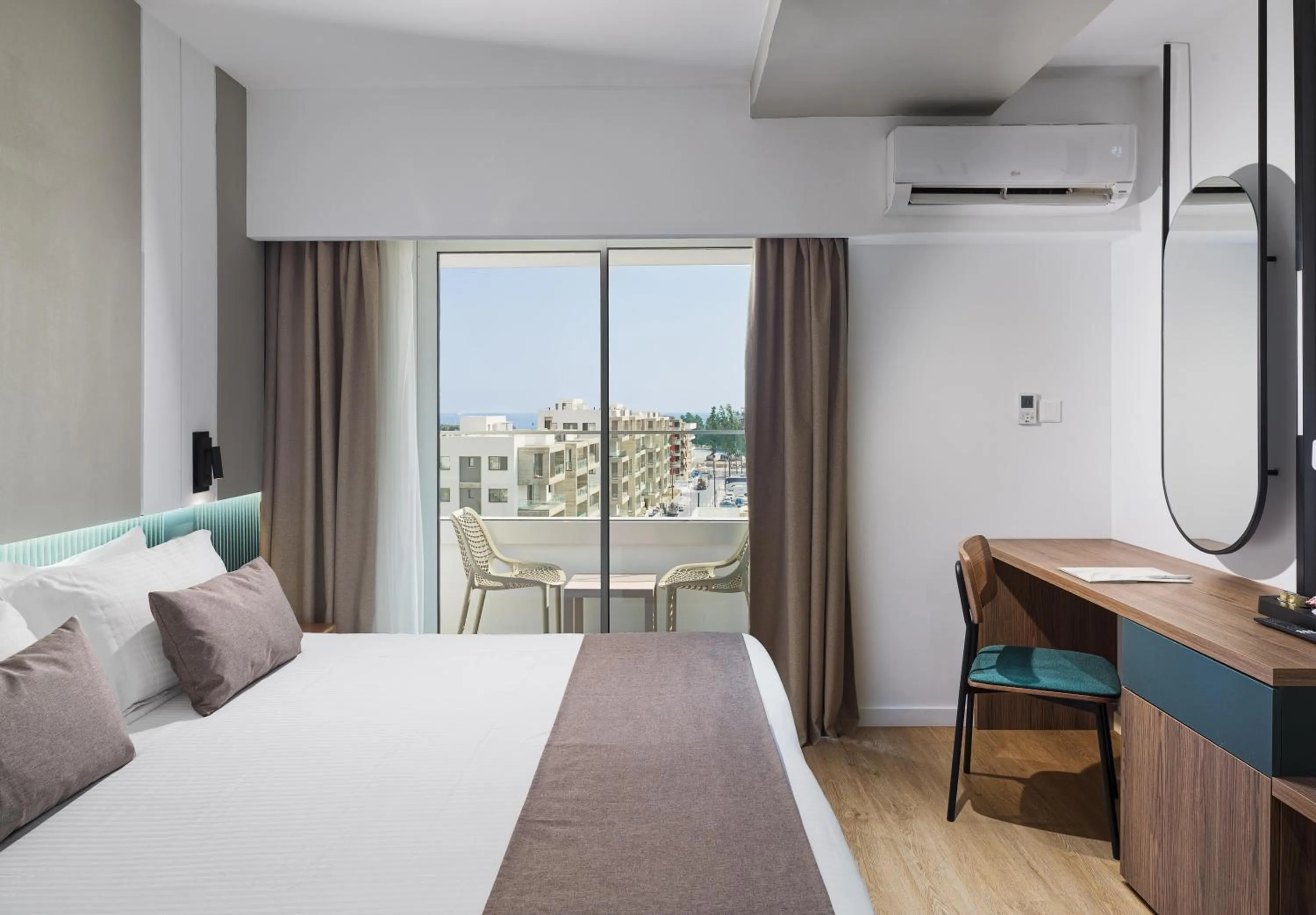 Bed in Pefkos City Hotel