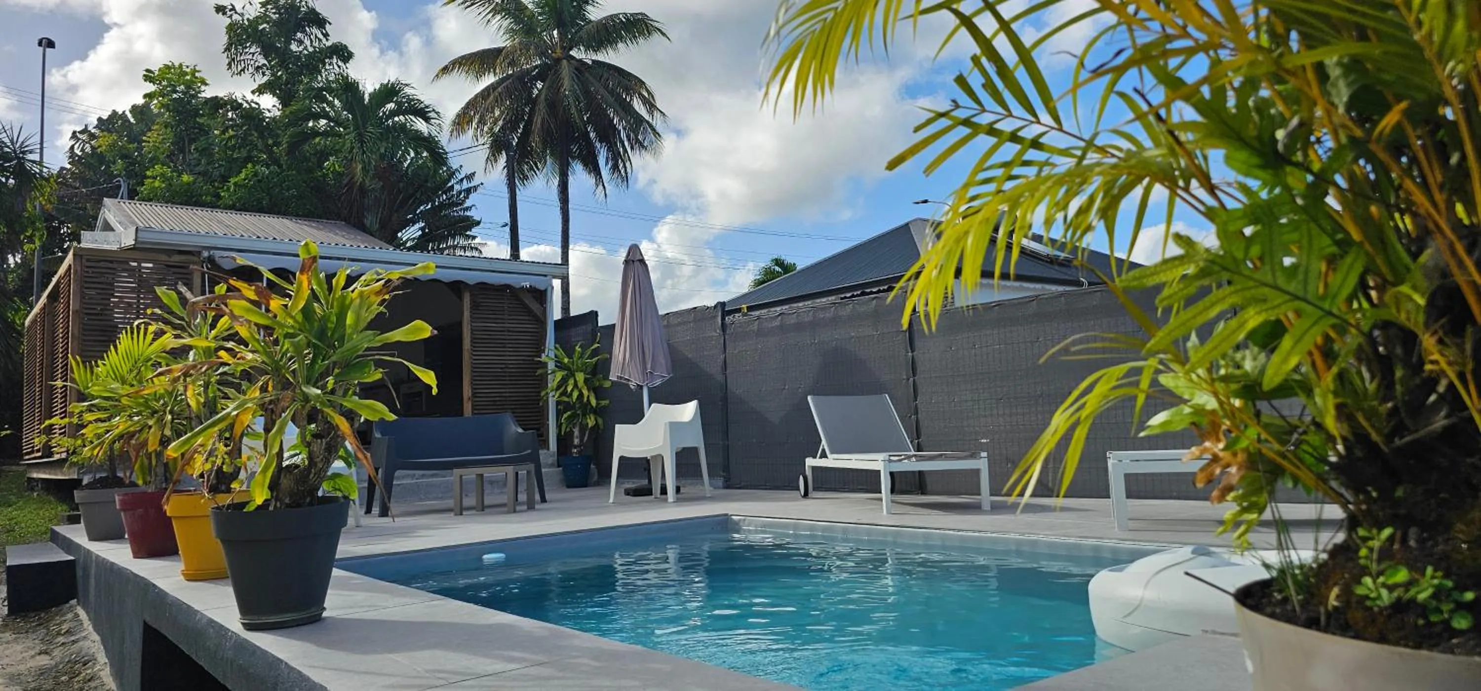 Swimming pool in Habitation Villa Les Cassias