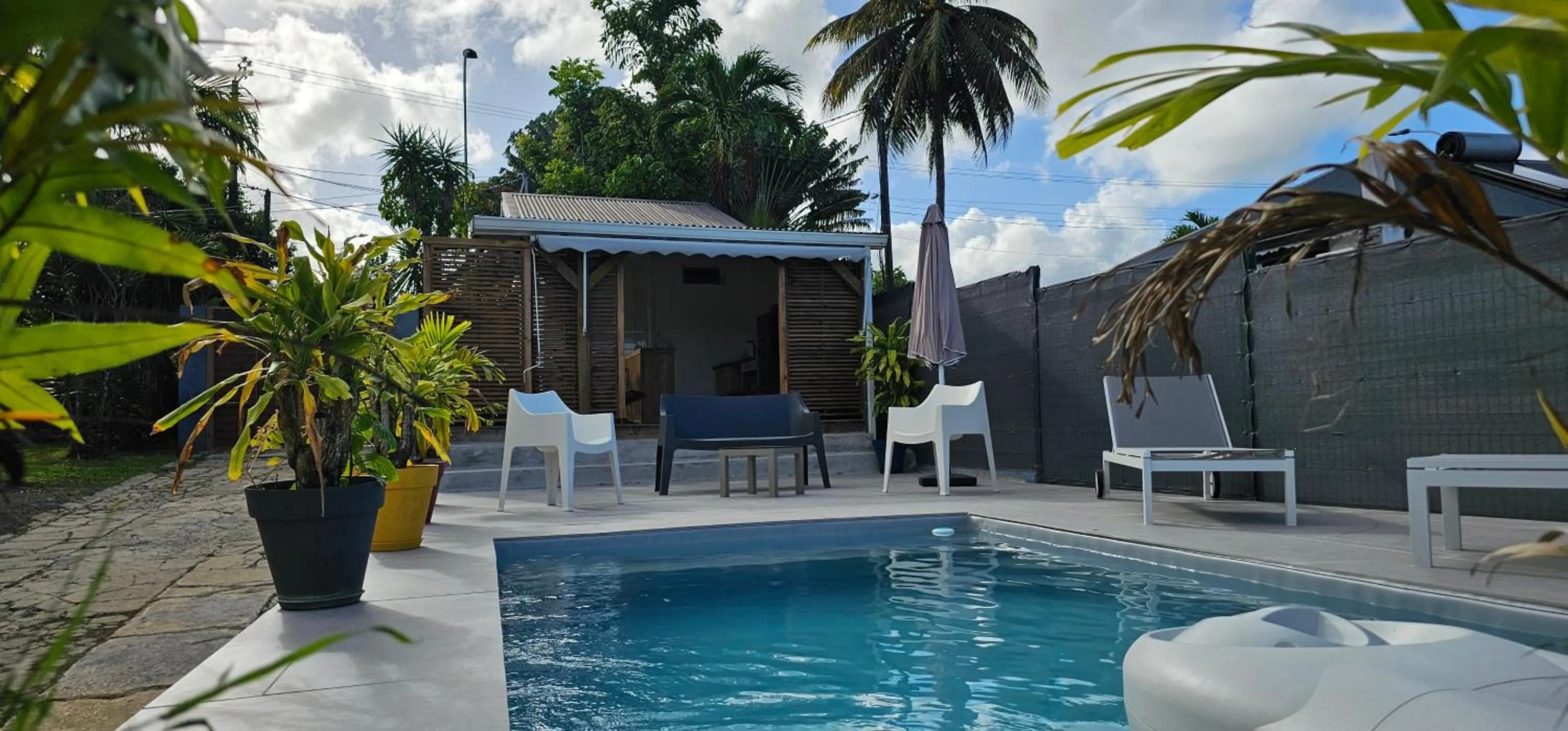 Swimming pool in Habitation Villa Les Cassias