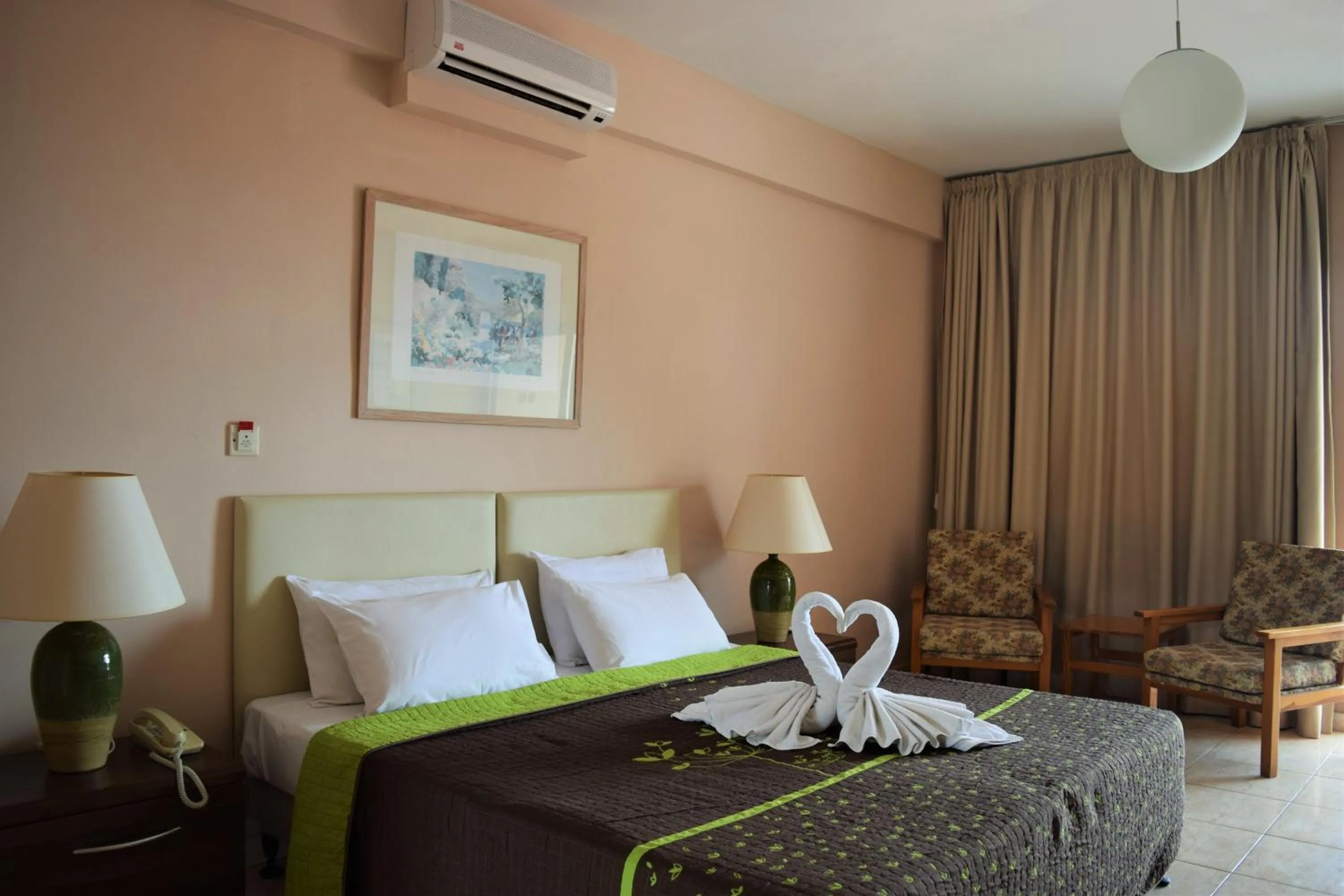 Seating area, Bed in Anna Hotel Apartments