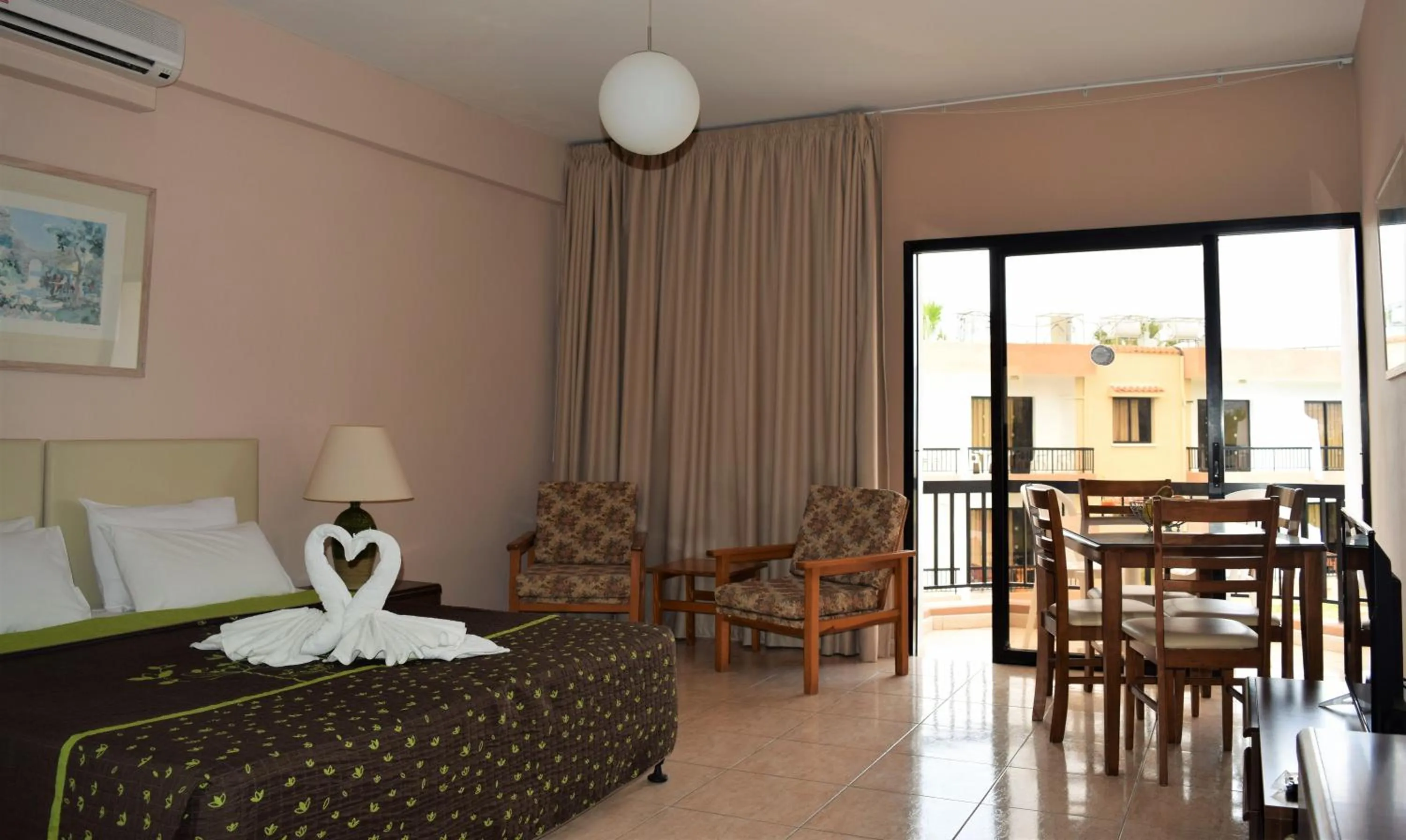 Bed in Anna Hotel Apartments