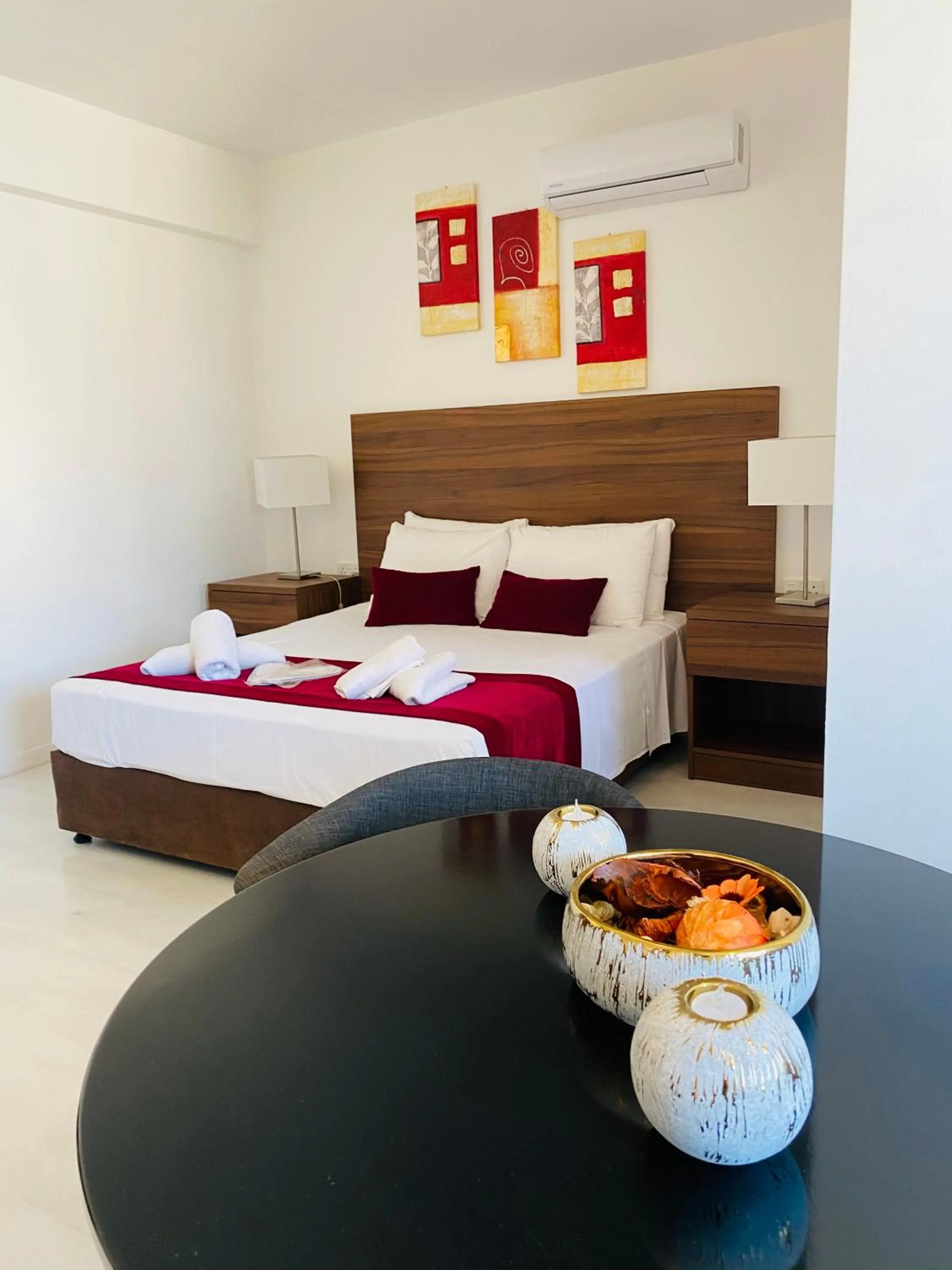 Bed in Eleonora Hotel Apartments