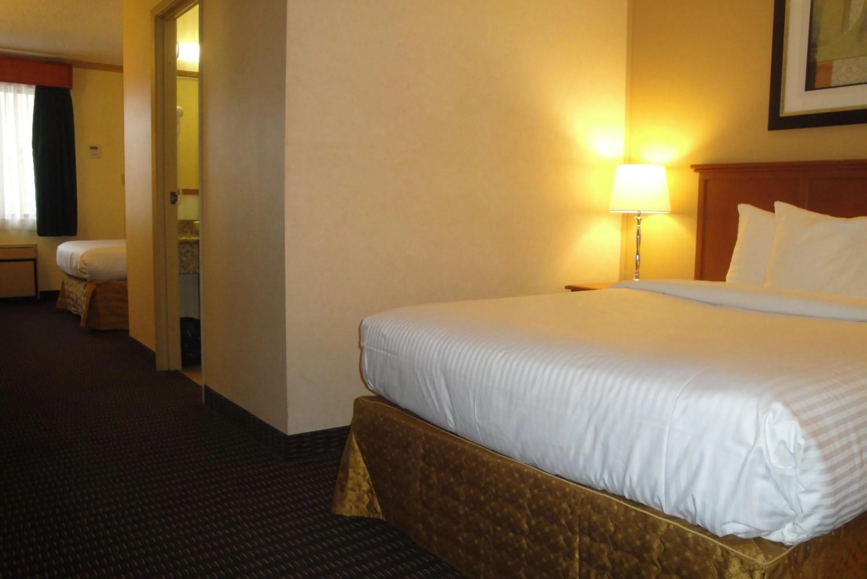 Bed in All Stay Suites