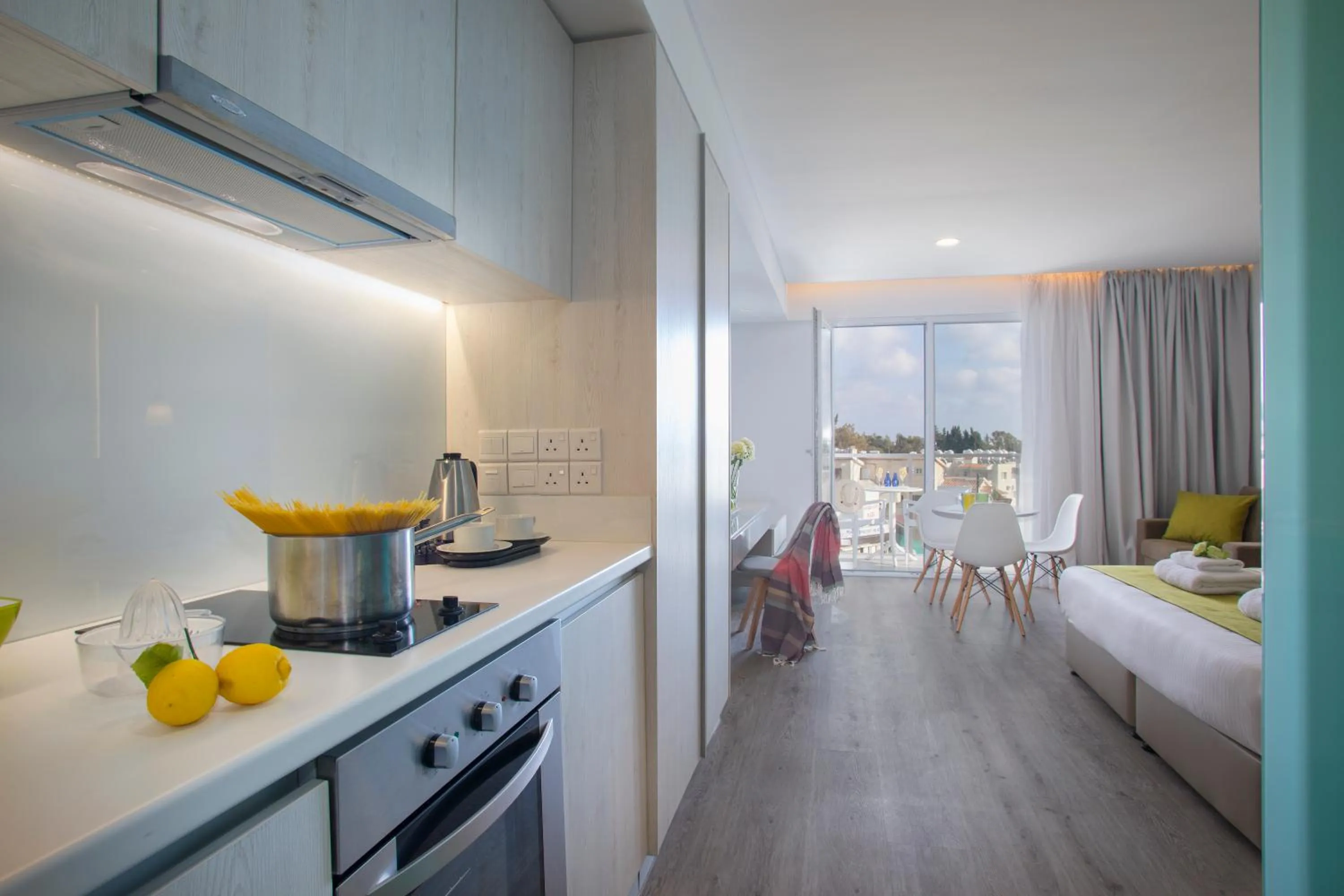 kitchen, Bed in Anemi Hotel & Suites