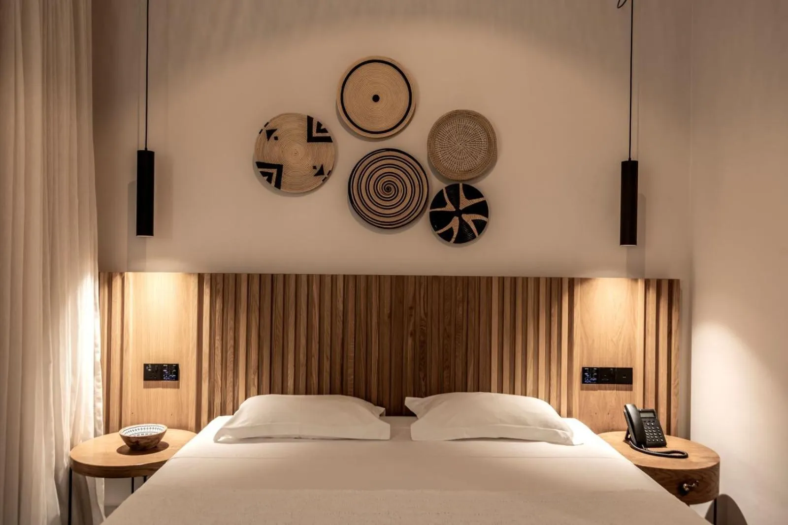 Bed in Anemi Hotel & Suites