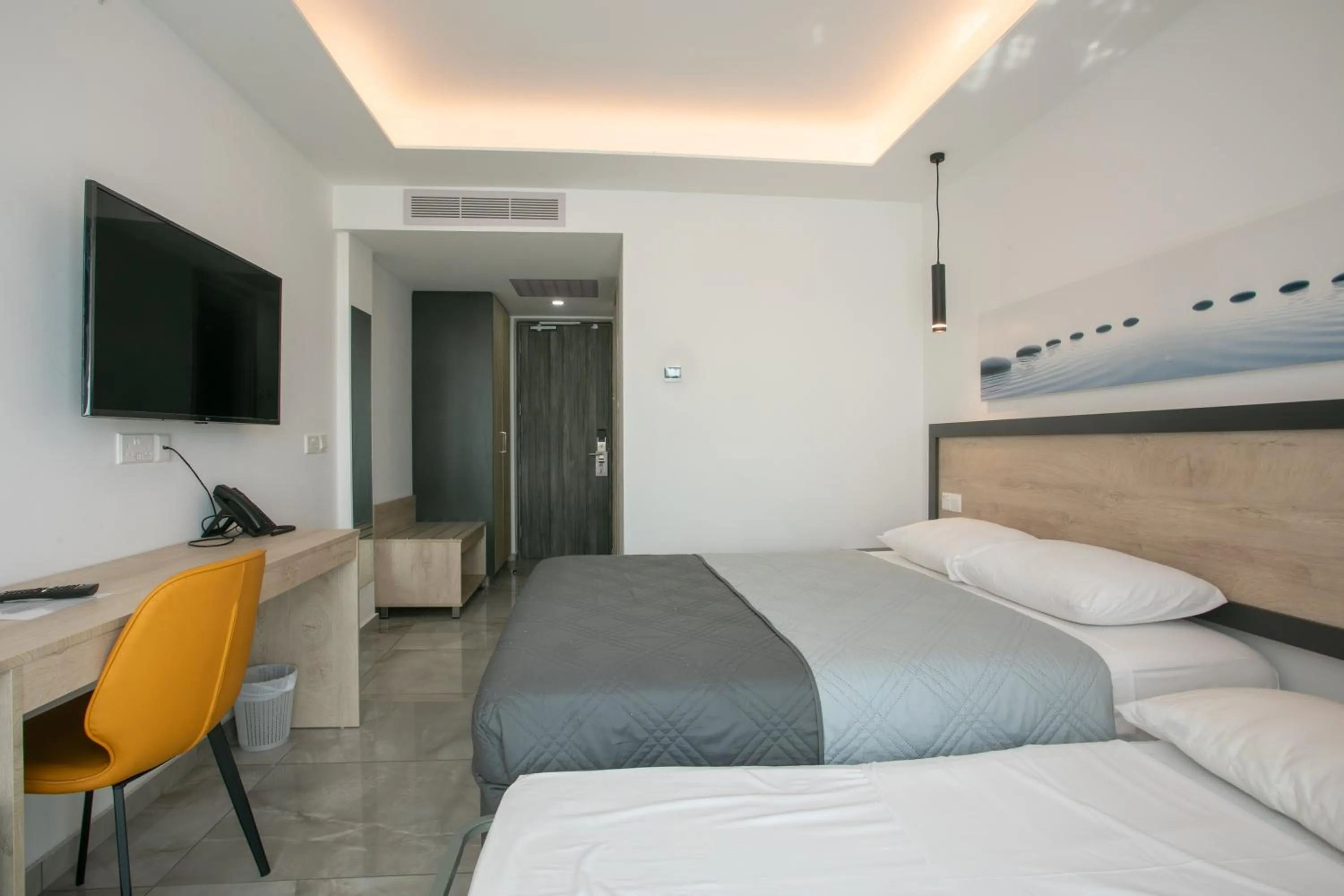 Bed in Papouis Protaras Hotel