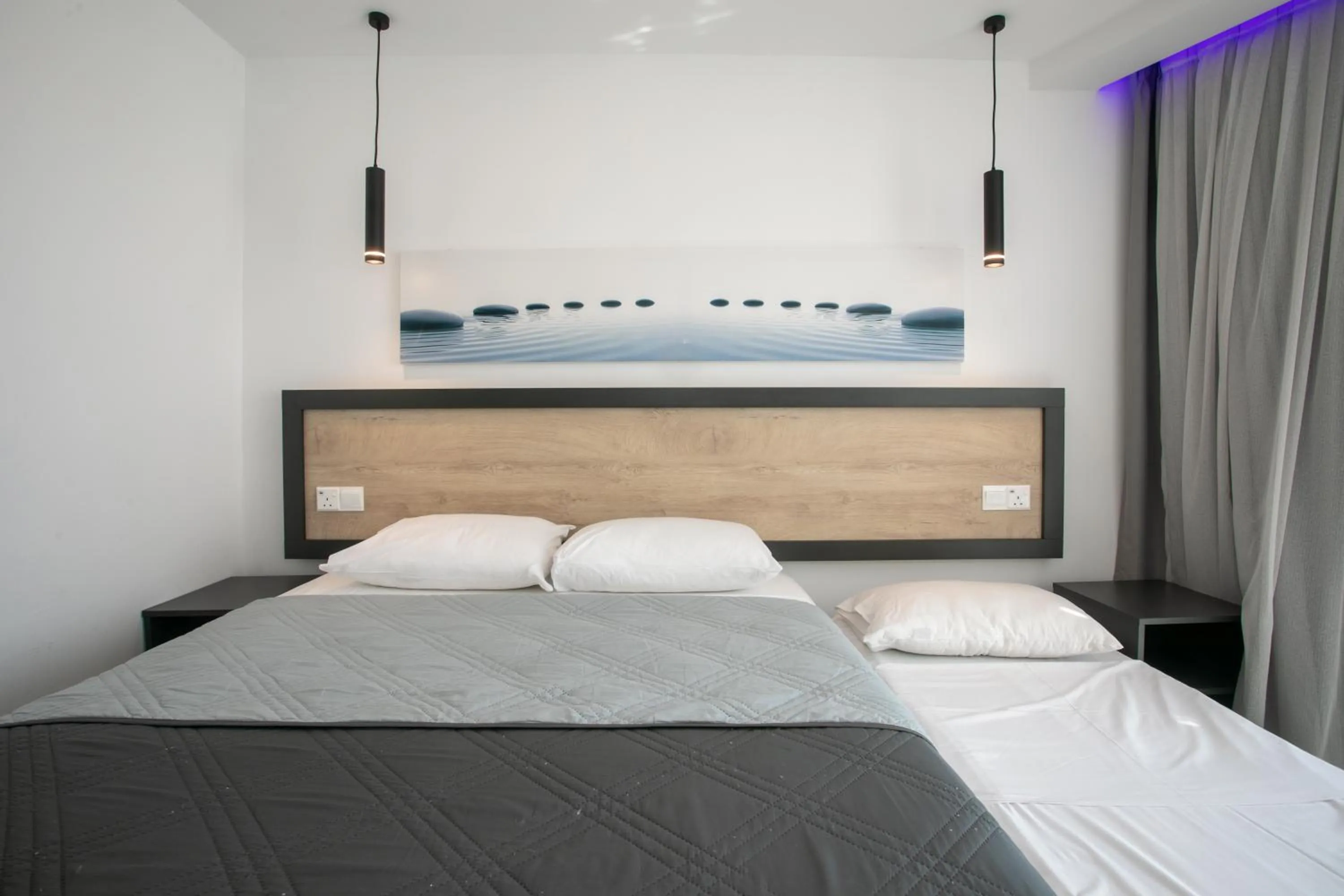 Bed in Papouis Protaras Hotel