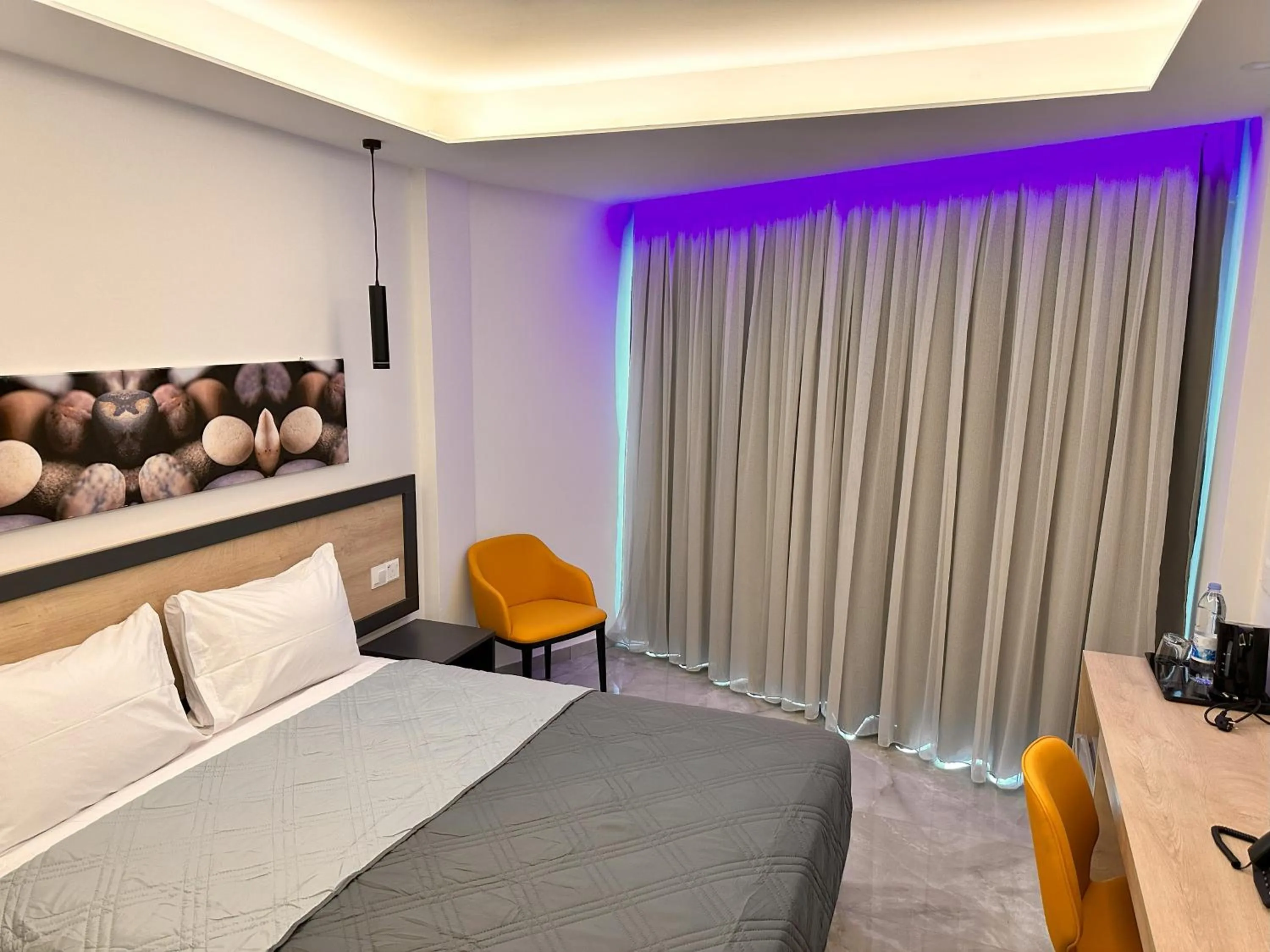 Bed in Papouis Protaras Hotel