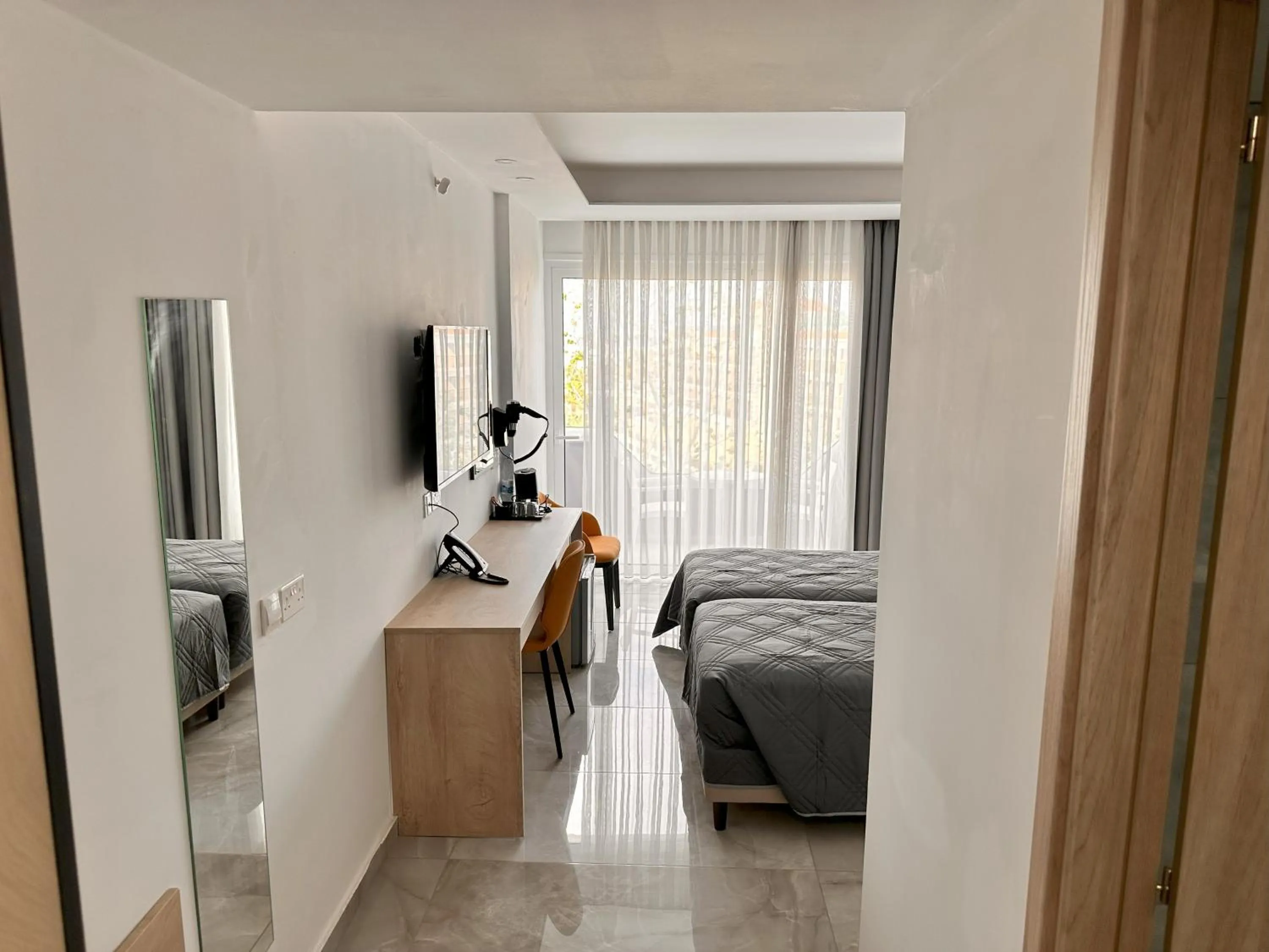 Bed in Papouis Protaras Hotel