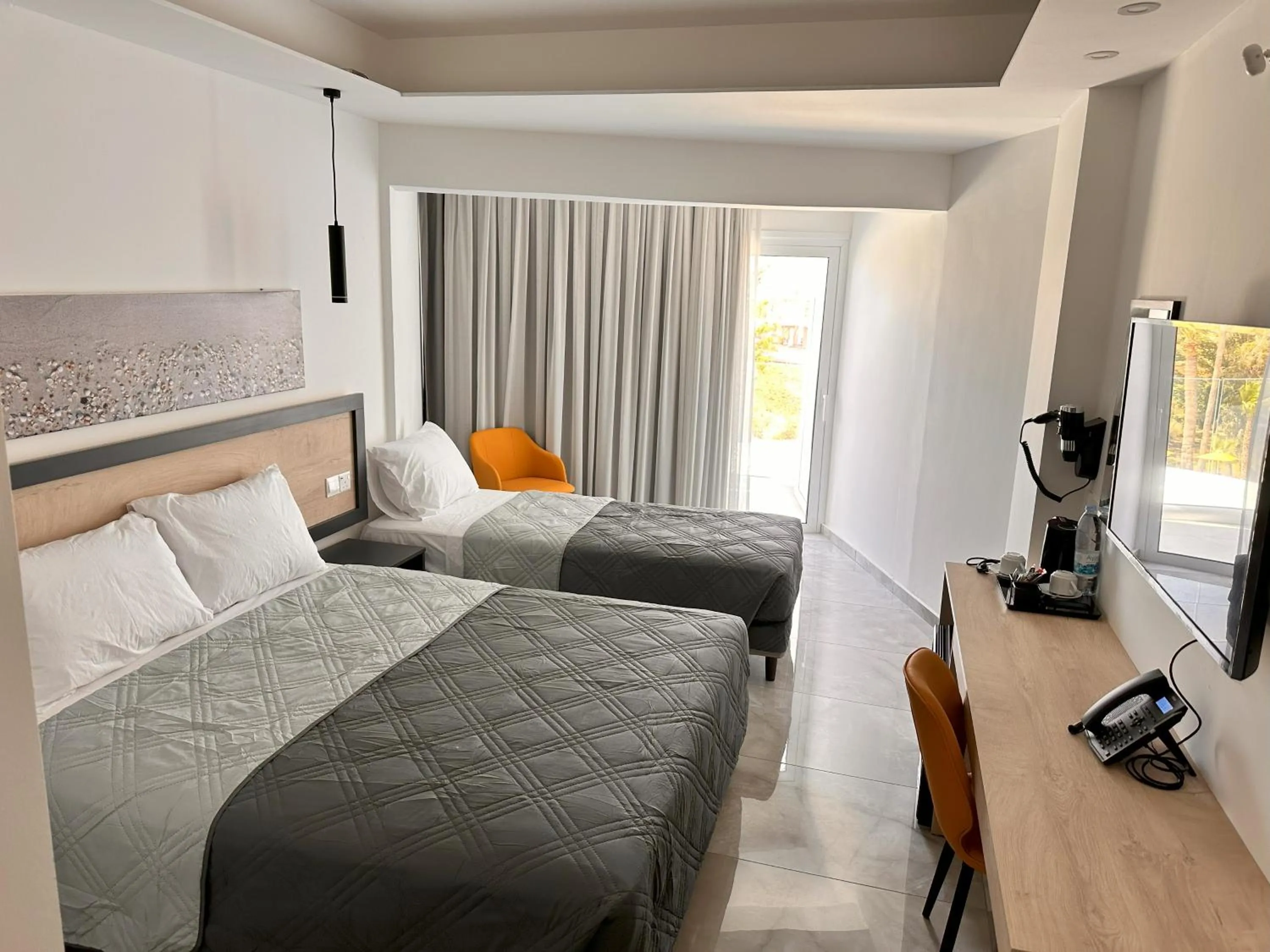 Bed in Papouis Protaras Hotel