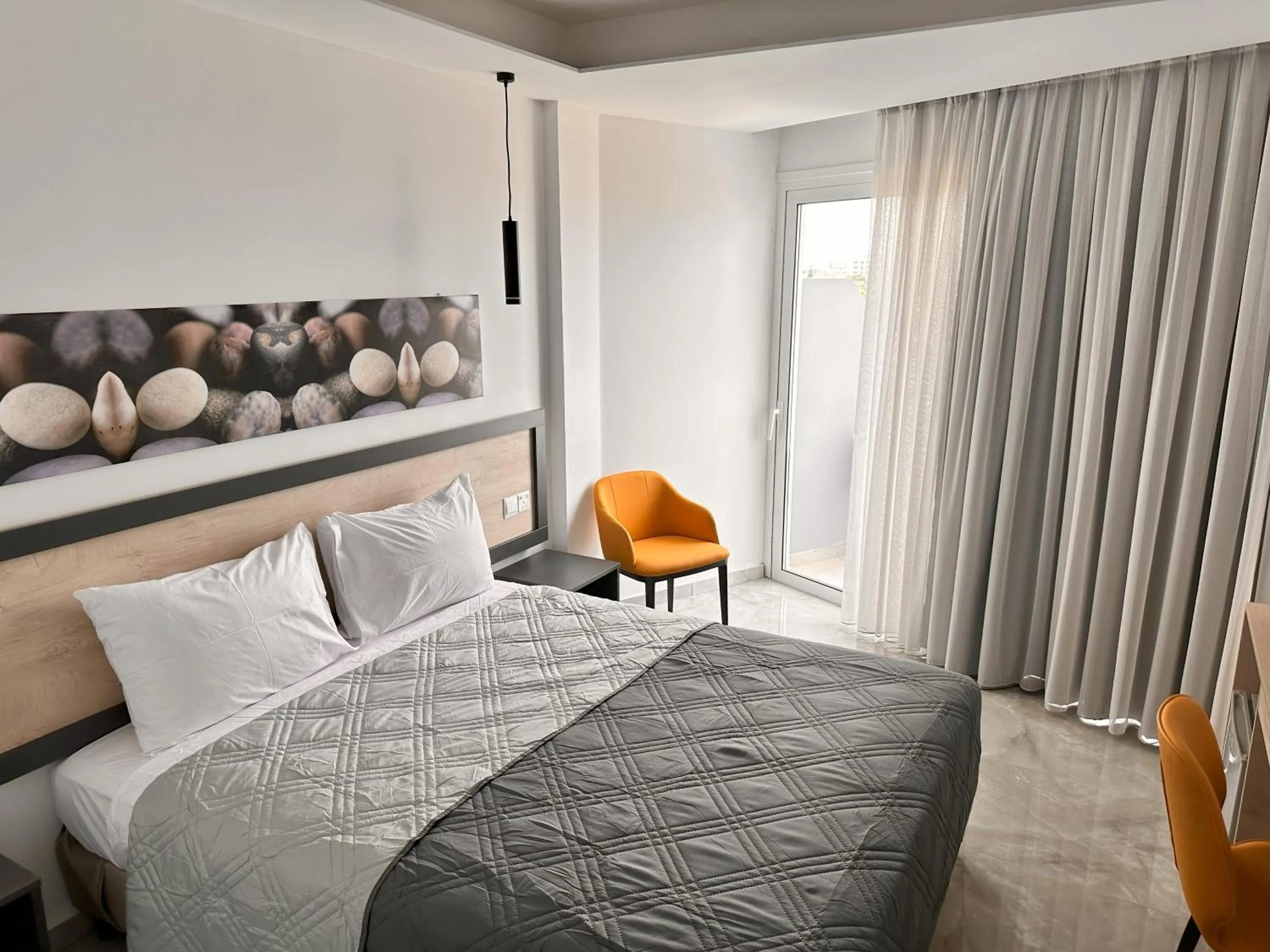 Bed in Papouis Protaras Hotel