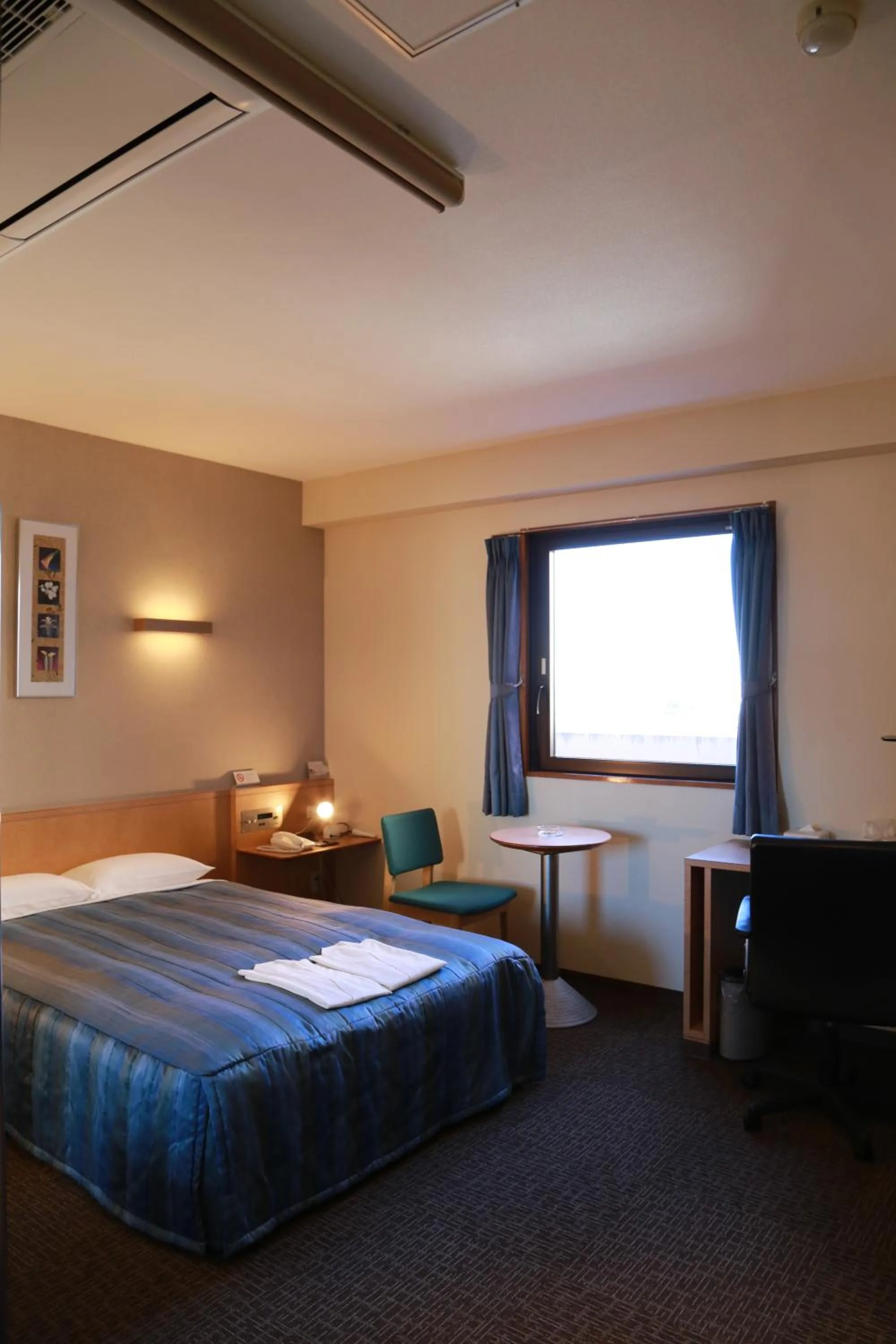 Bed in Hotel Plaza Arakawaoki